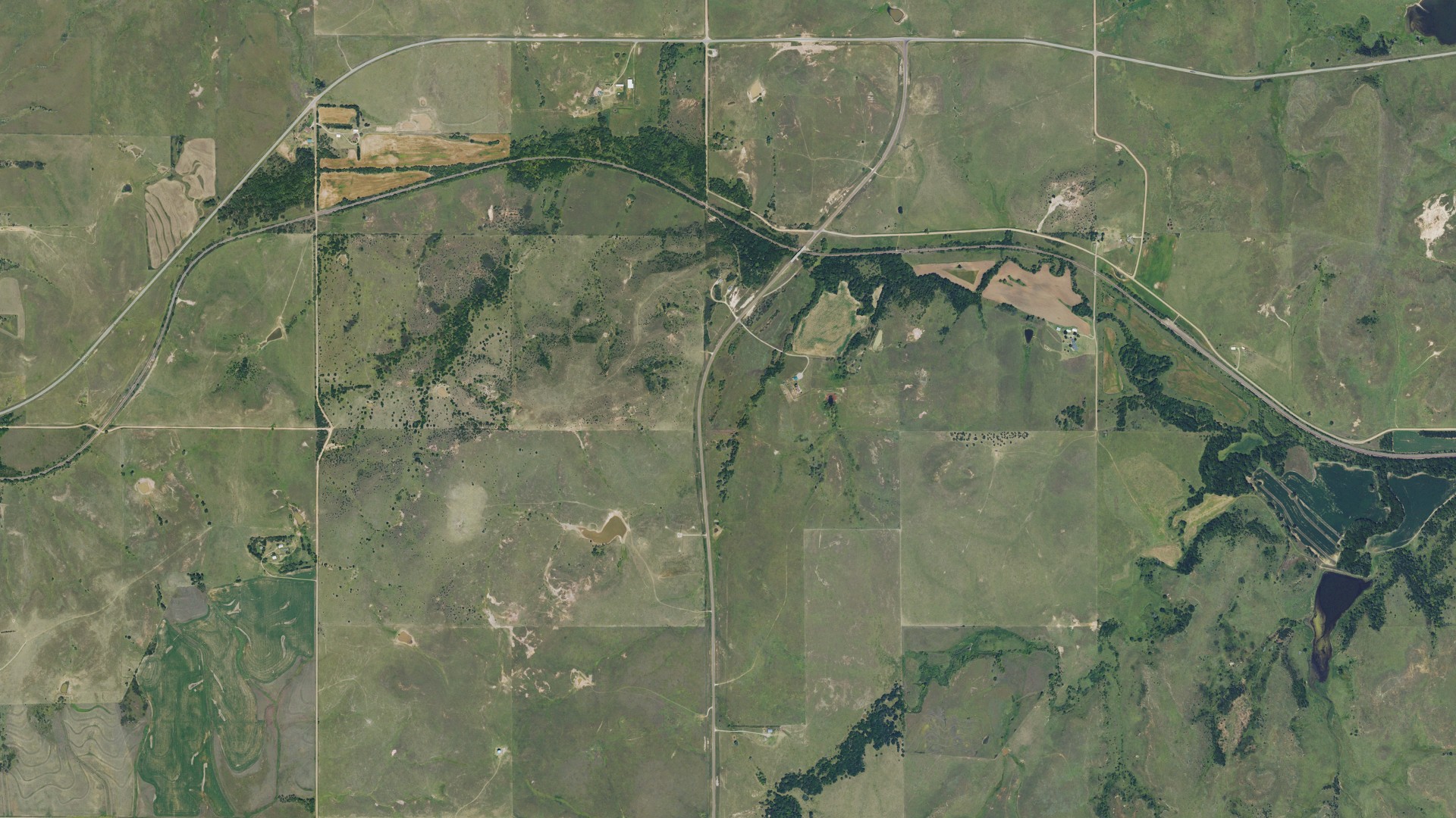 Natural-color aerial photograph of land around Carneiro, Kansas