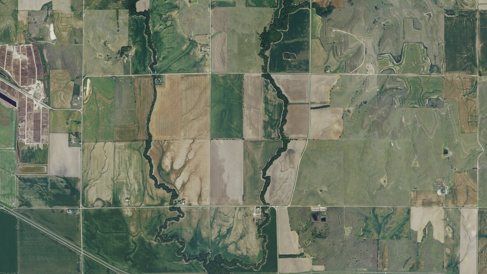 Natural-color aerial photograph of land around Asherville, Kansas
