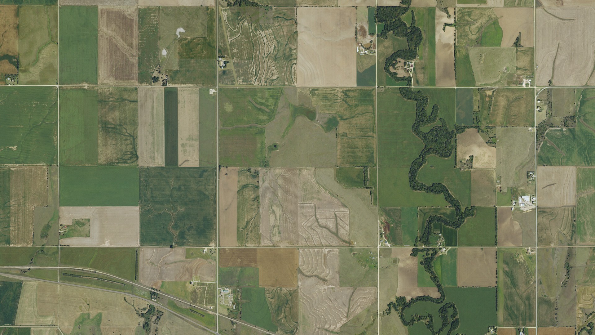 Natural-color aerial photograph of land around Glen Elder, Kansas