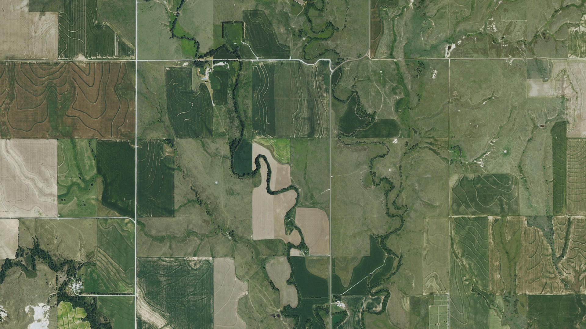 Natural-color aerial photograph of land around Logan, Kansas