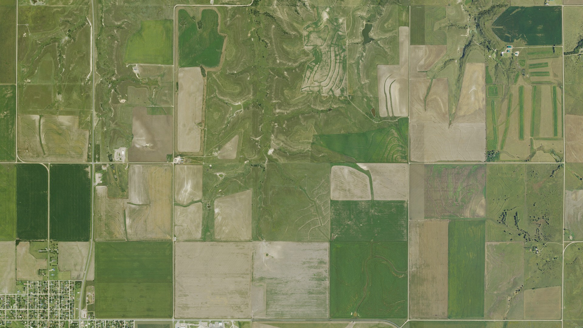 Aerial view of land around Russell, Kansas