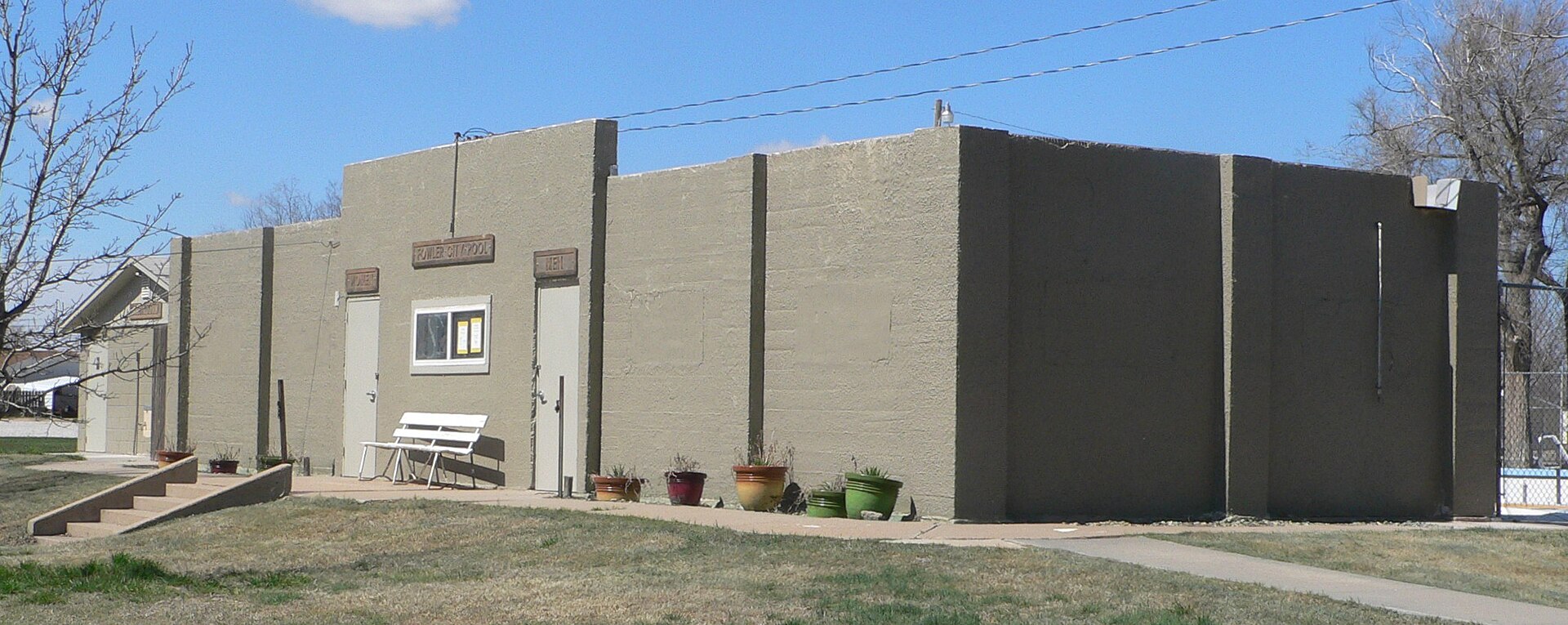 Bathhouse at municipal swimming pool in Fowler, Kansas; seen from the southeast.