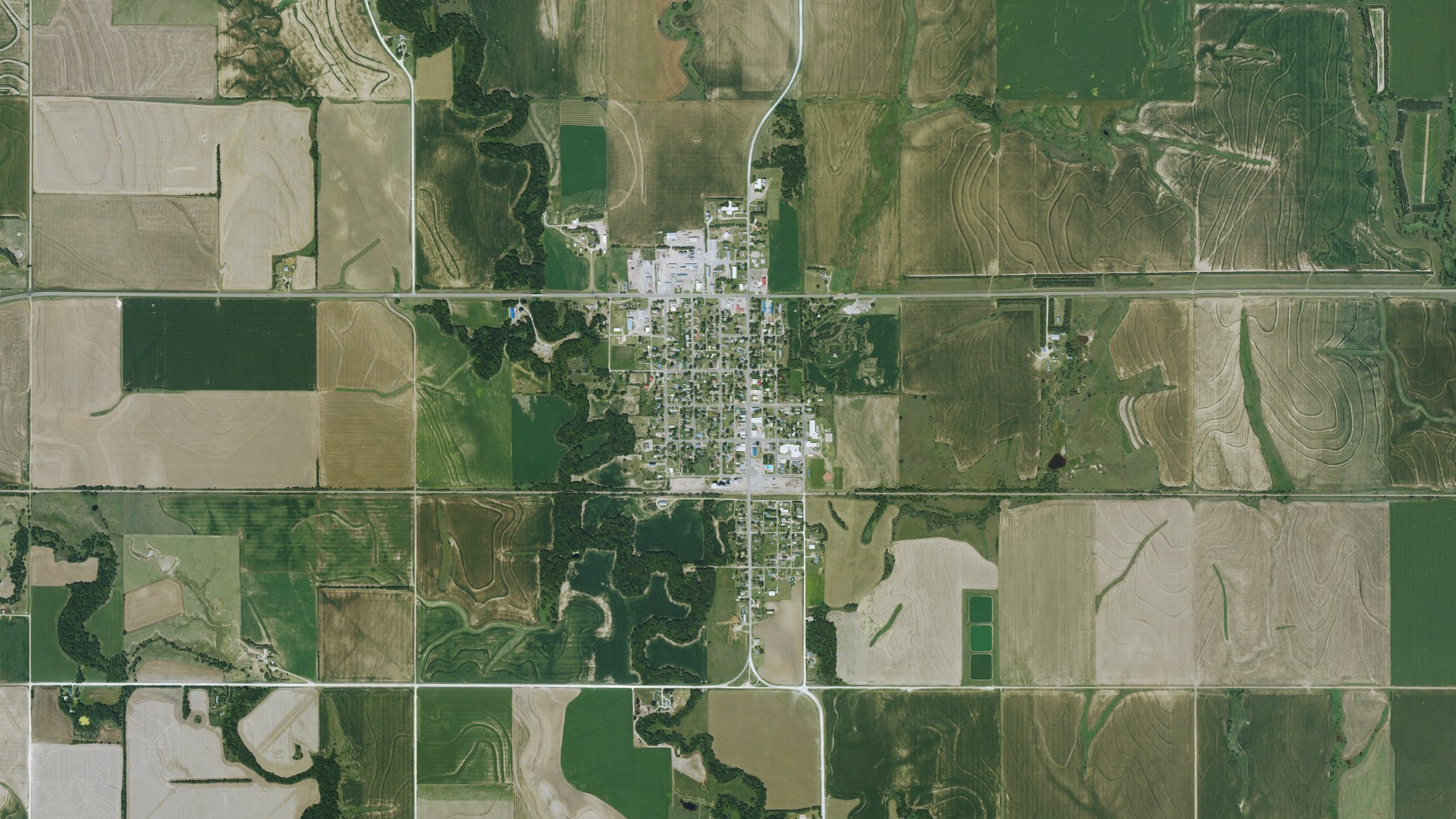 Natural-color aerial photograph of land around Kensington, Kansas