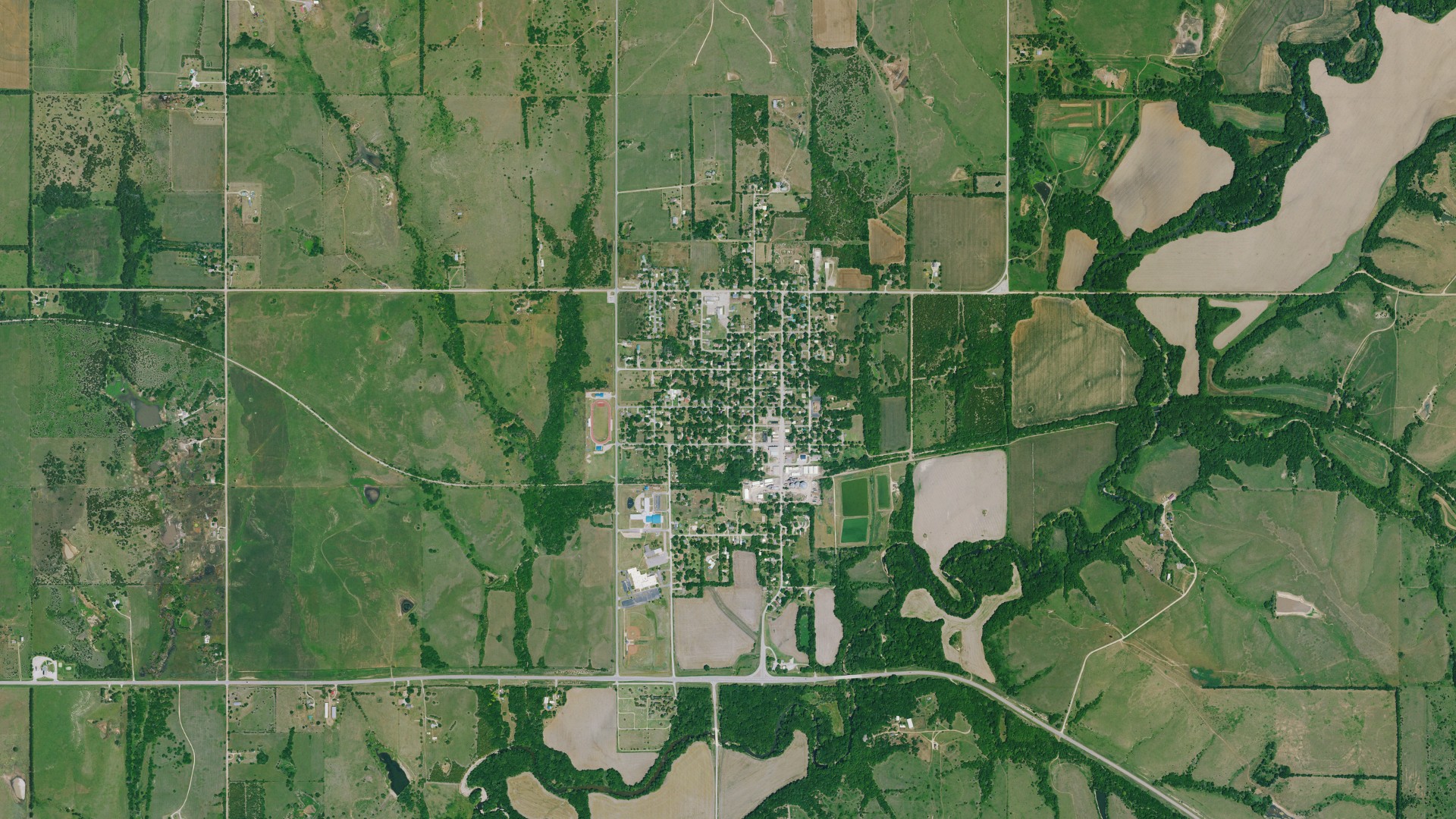Natural-color aerial photograph of land around Leon, Kansas