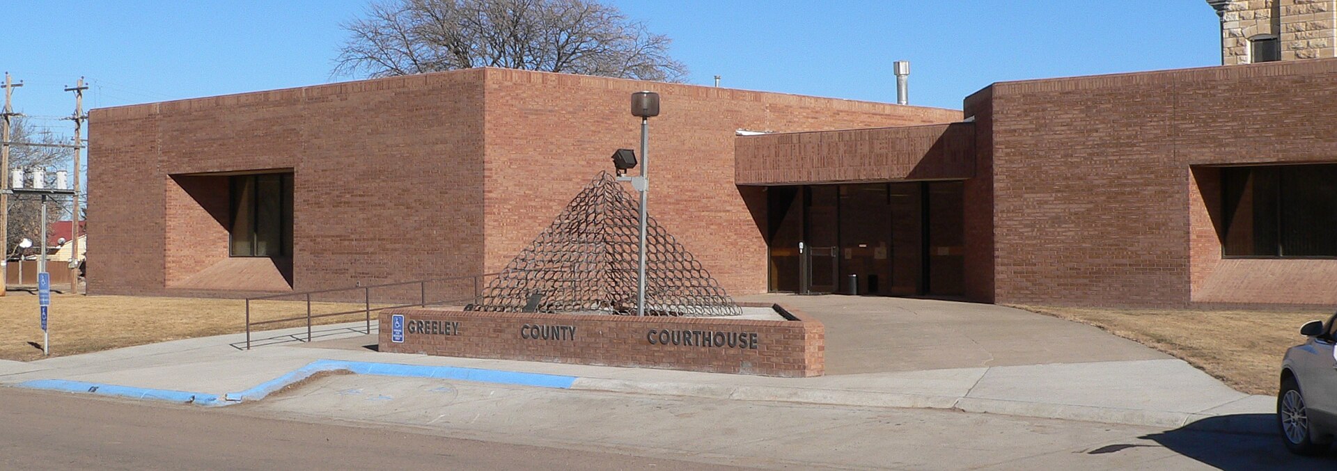 Front (west) entrance of Greeley County courthouse in Tribune, Kansas. The courthouse was built in 1975.