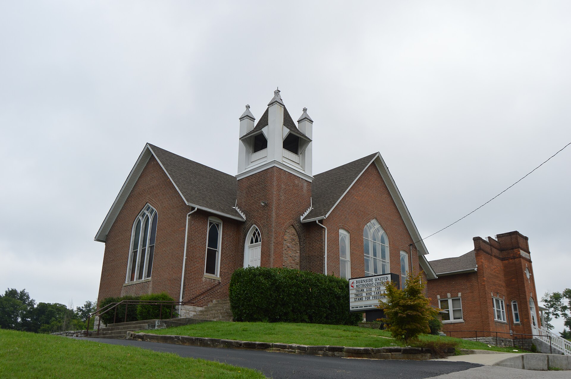 Front and southern side of the Burnside Methodist Church, located on the western side of Central Avenue in Burnside, Kentucky, United States.