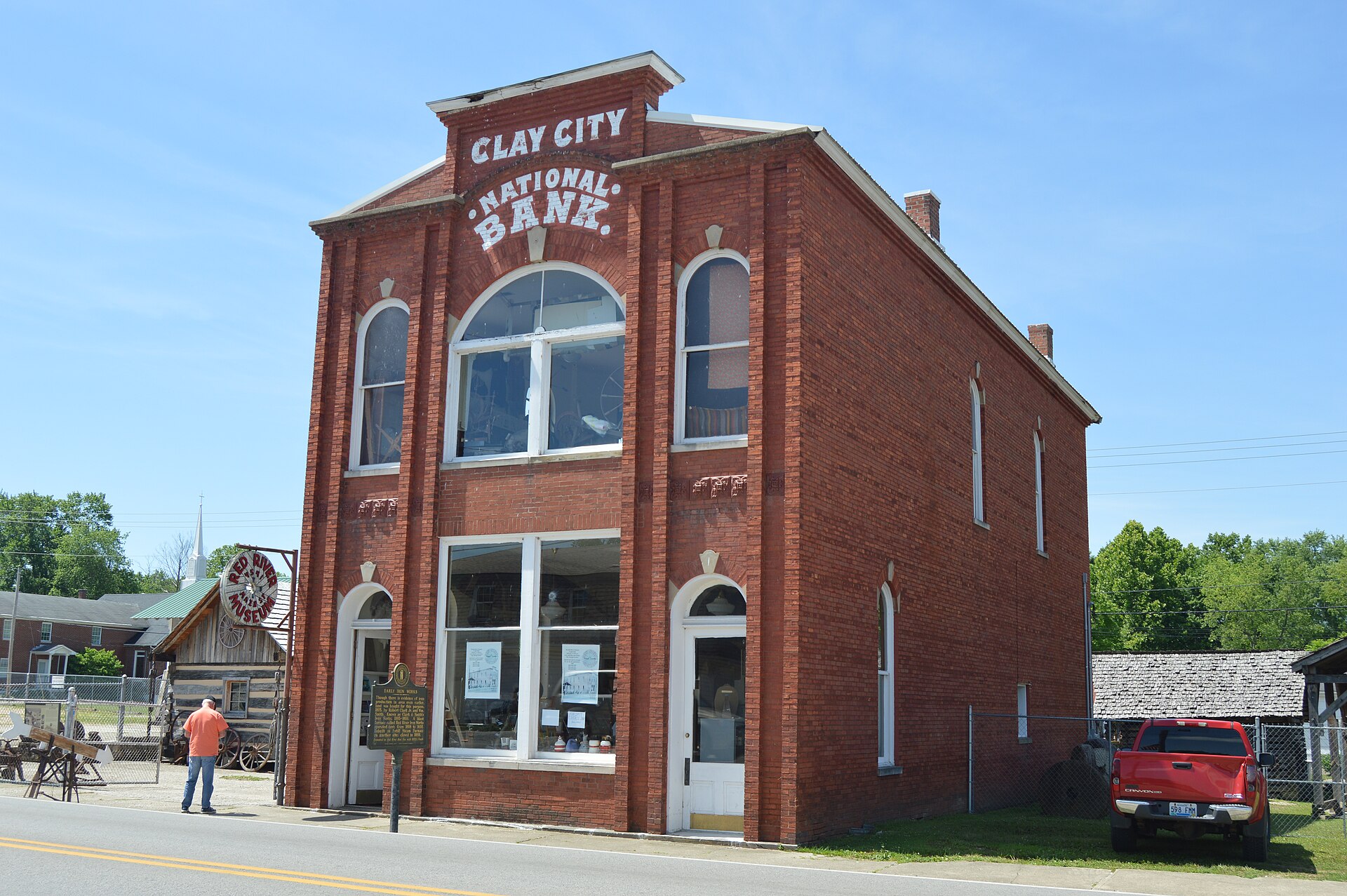Front and northwestern side of the Clay City National Bank Building, located on the southwestern side of Main Street (Kentucky Routes 11/15) in central Clay City, Kentucky, United States.