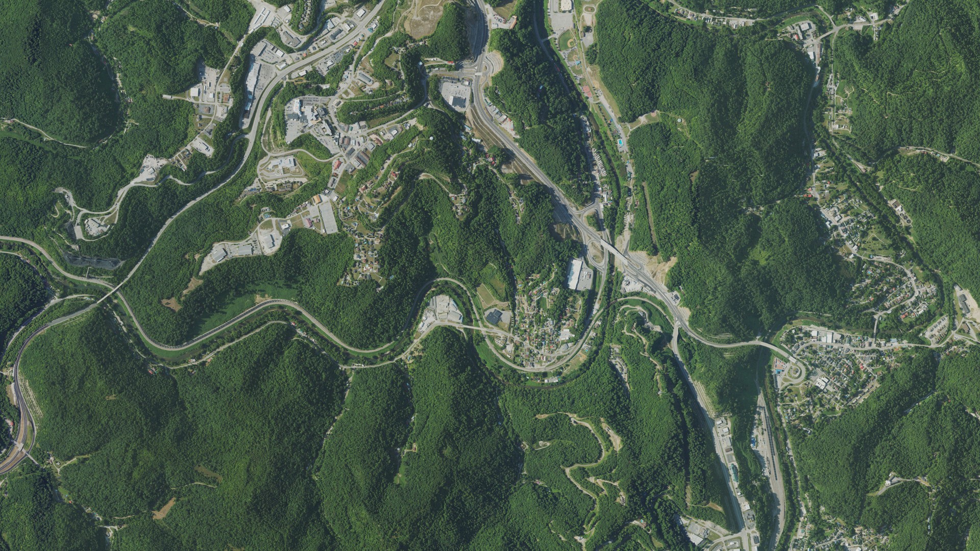 Natural-color aerial photograph of land around Combs, Kentucky