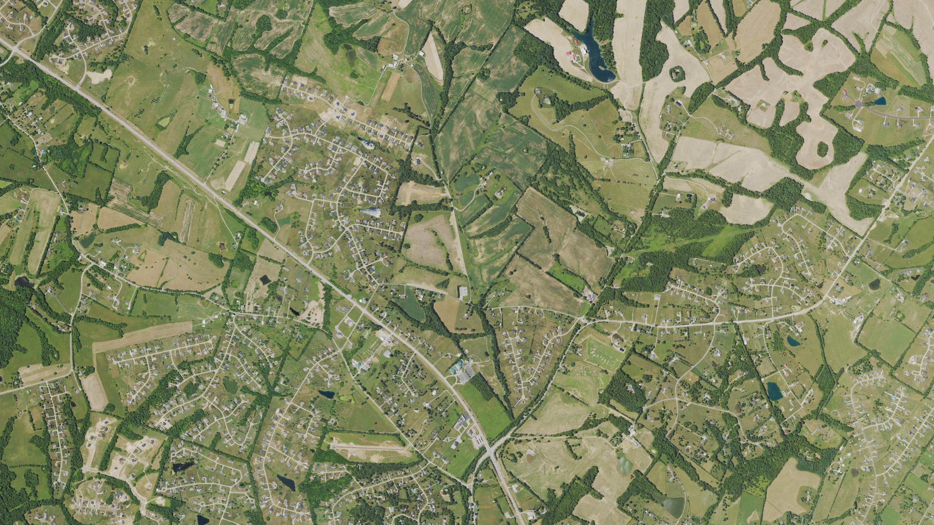 Natural-color aerial photograph of land around Elk Creek, Kentucky