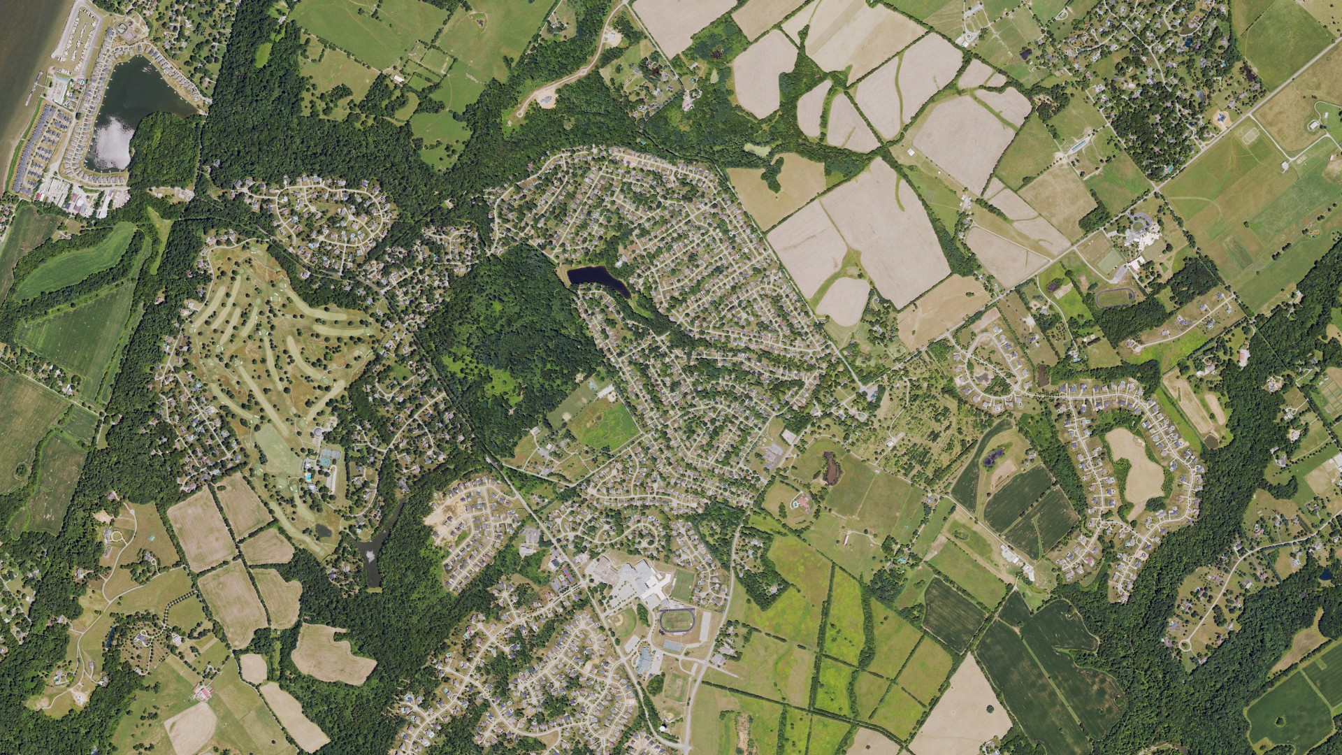 Natural-color aerial photograph of land around Goshen, Kentucky