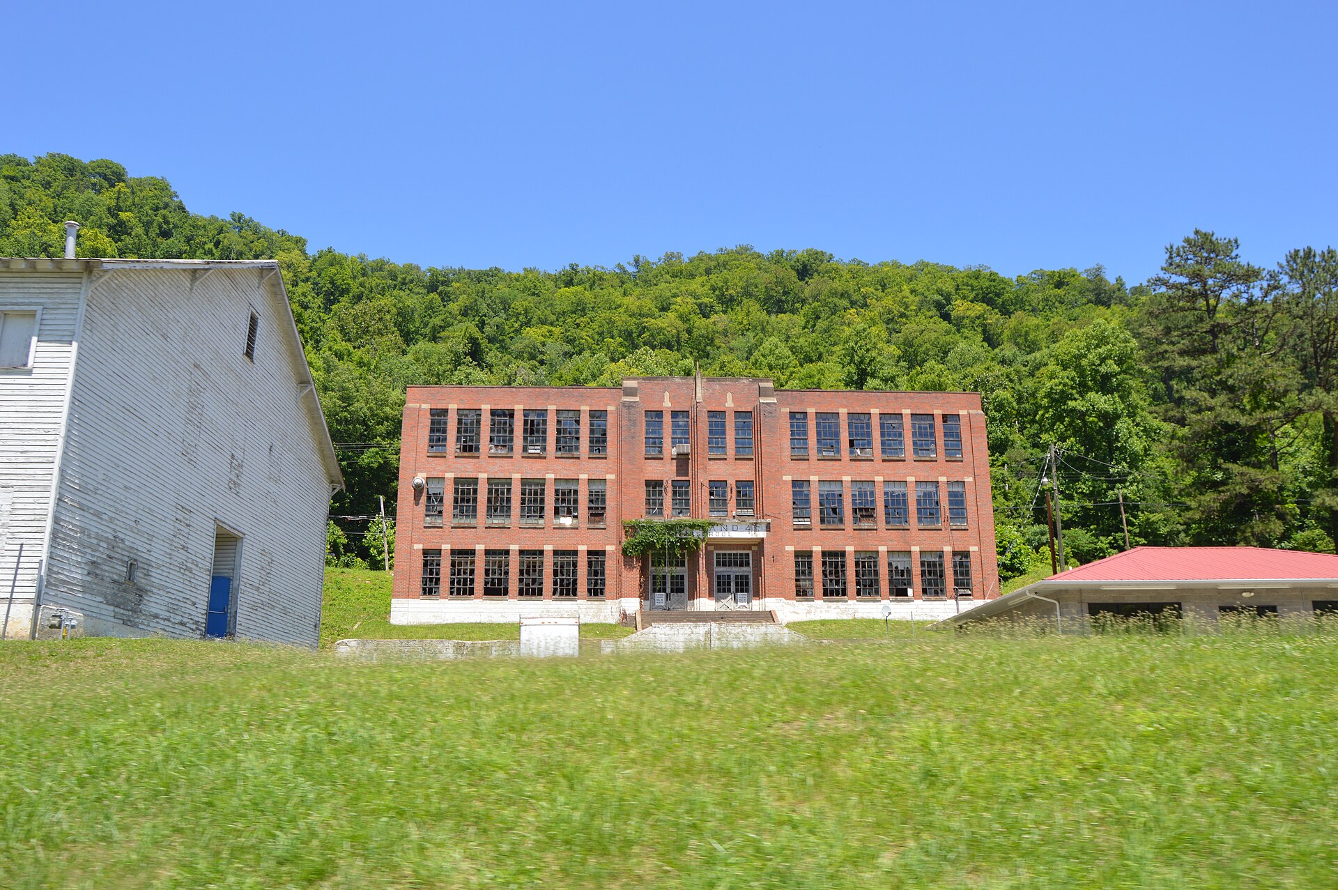 Front of the old Wayland High School, located on the northeastern side of Kentucky Route 7 at the northwestern end of Wayland, Kentucky, United States. It was built in 1941.
