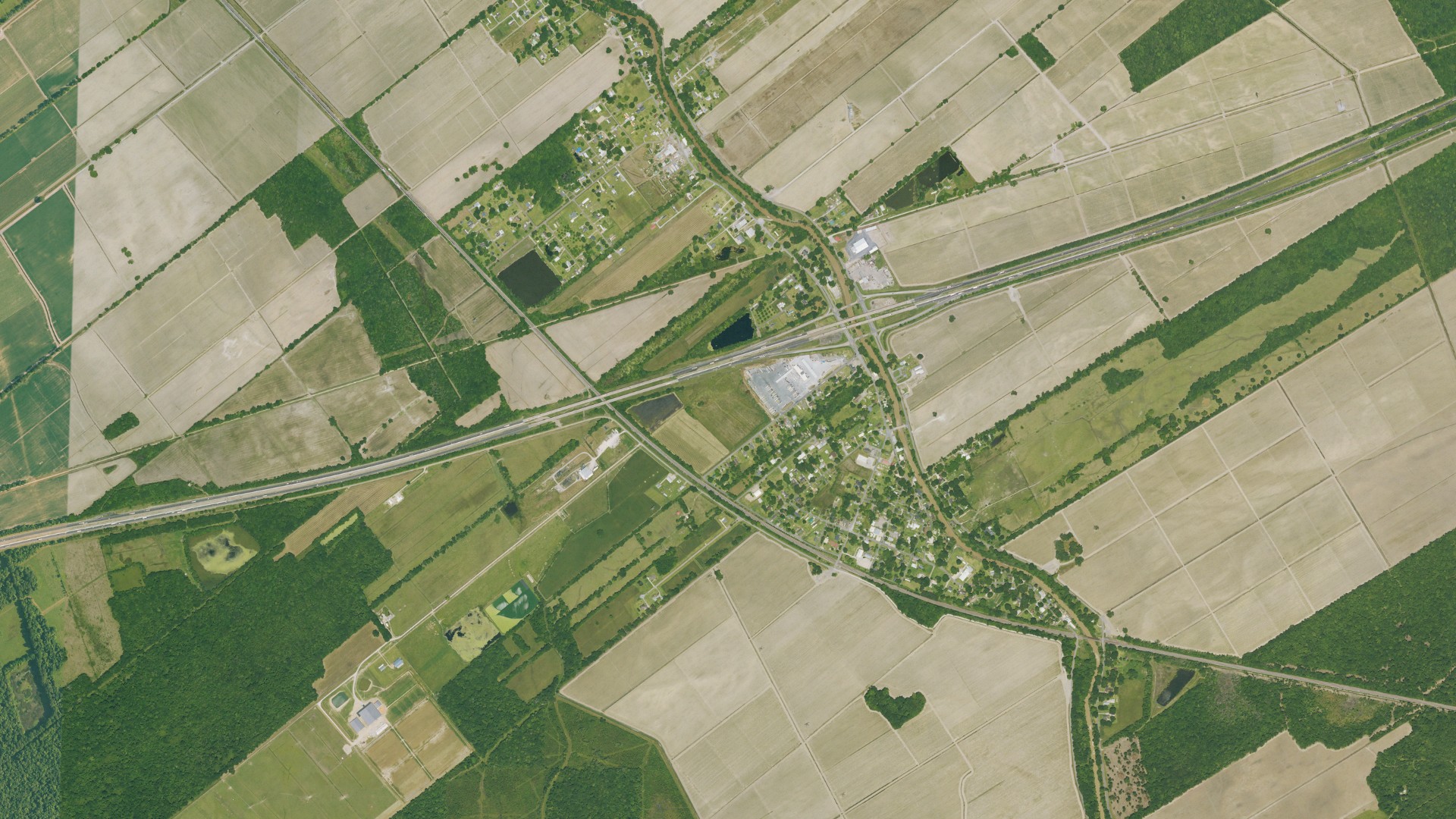 Natural-color aerial photograph of land around Grosse Tete, Louisiana