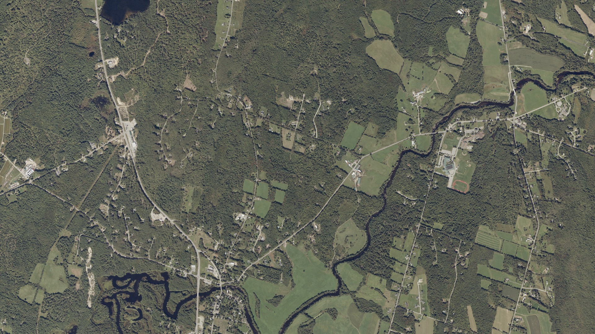 Natural-color aerial photograph of land around Turner, Maine