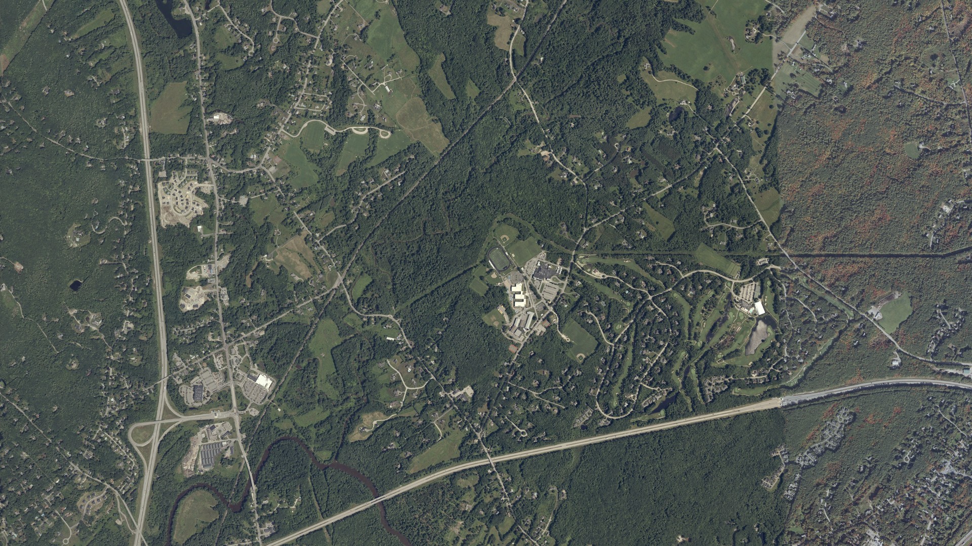 Natural-color aerial photograph of land around Falmouth, Maine