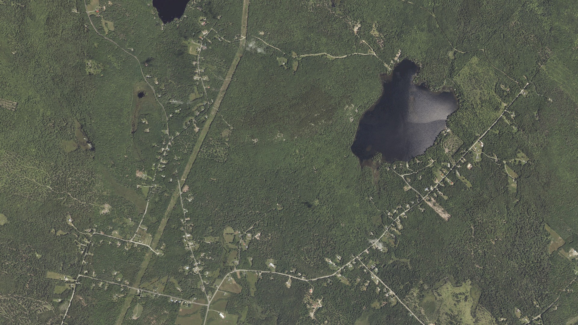 Natural-color aerial photograph of land around Bucksport, Maine