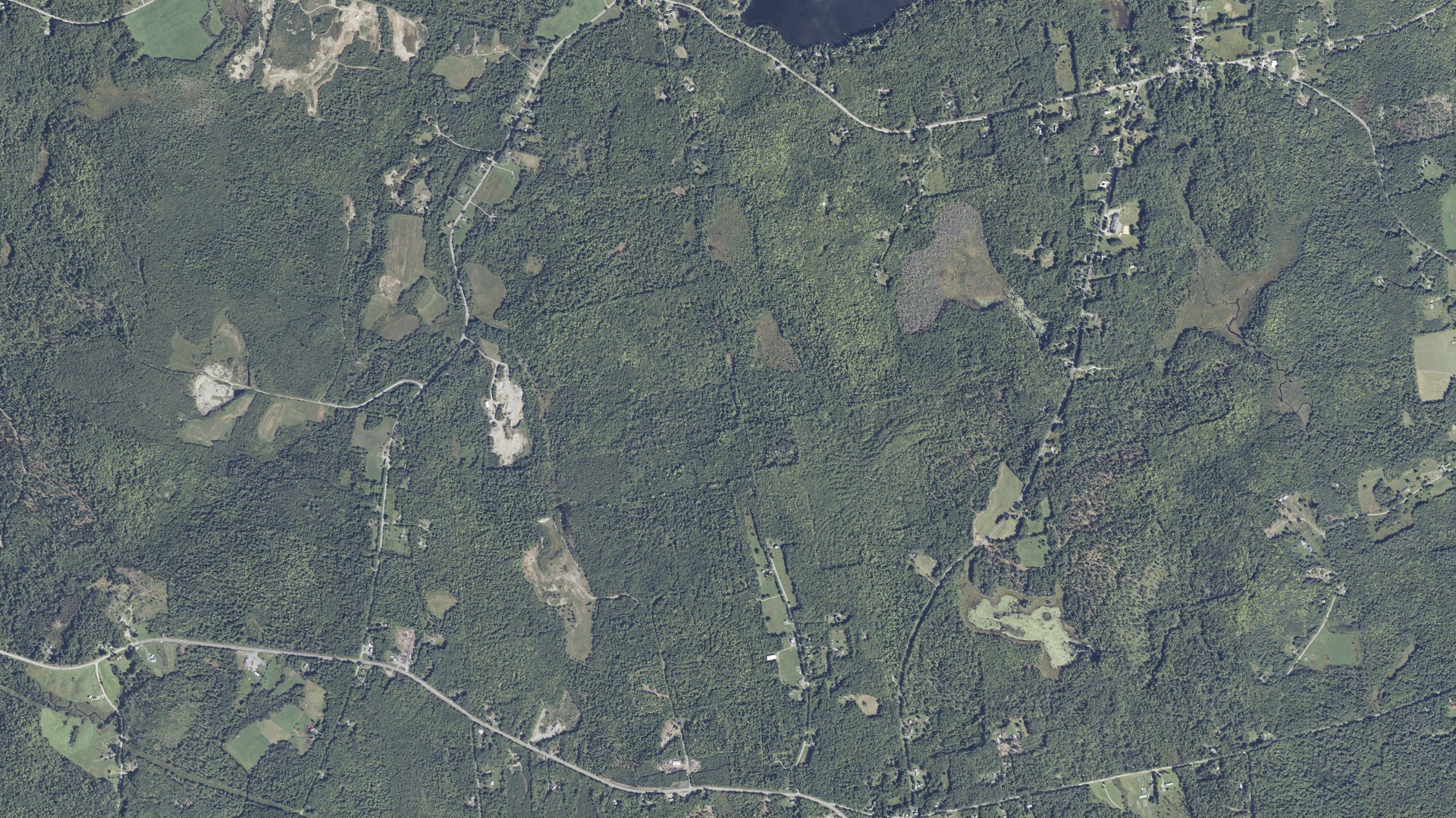 Natural-color aerial photograph of land around Washington, Maine