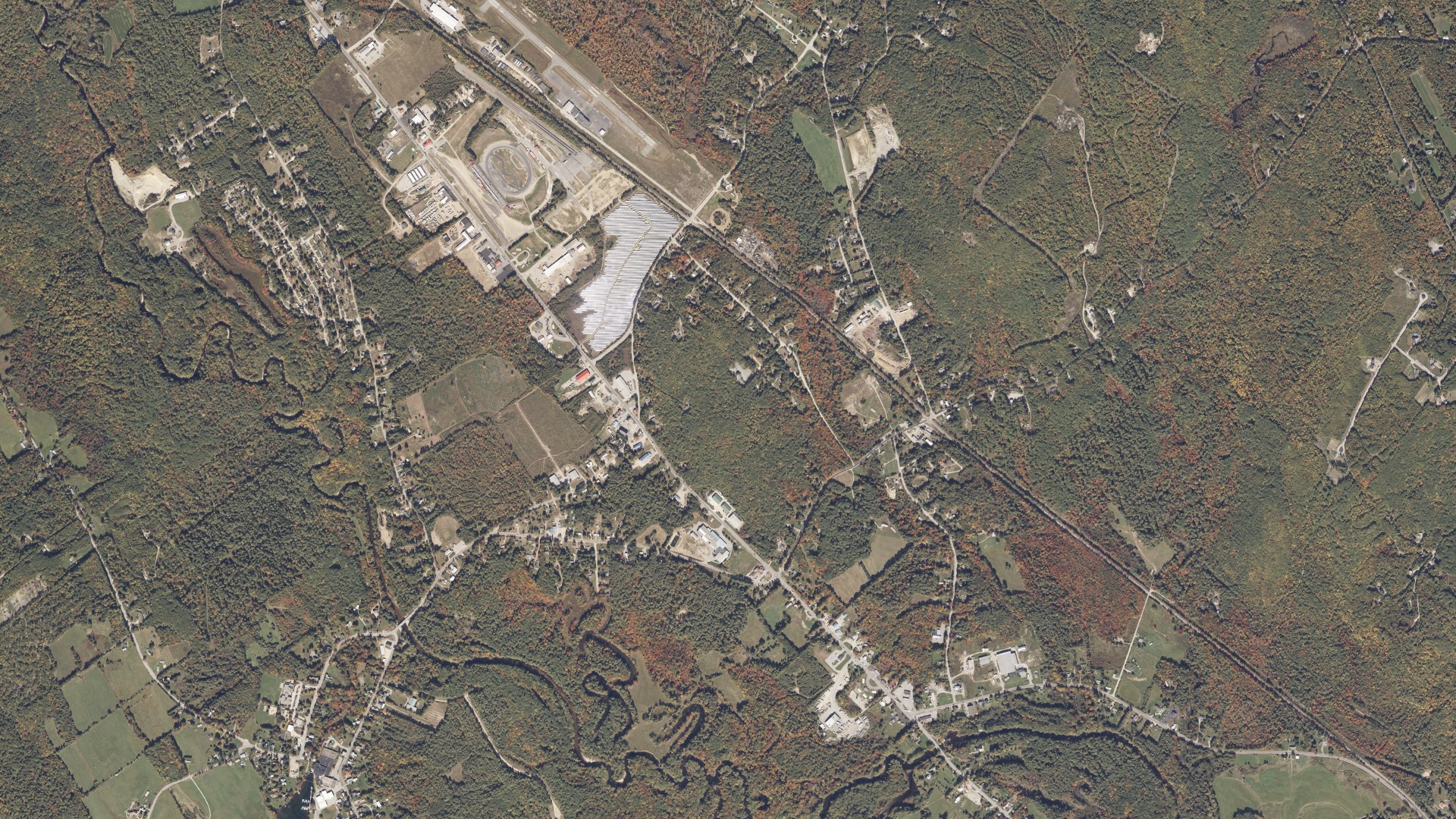 Natural-color aerial photograph of land around Oxford, Maine