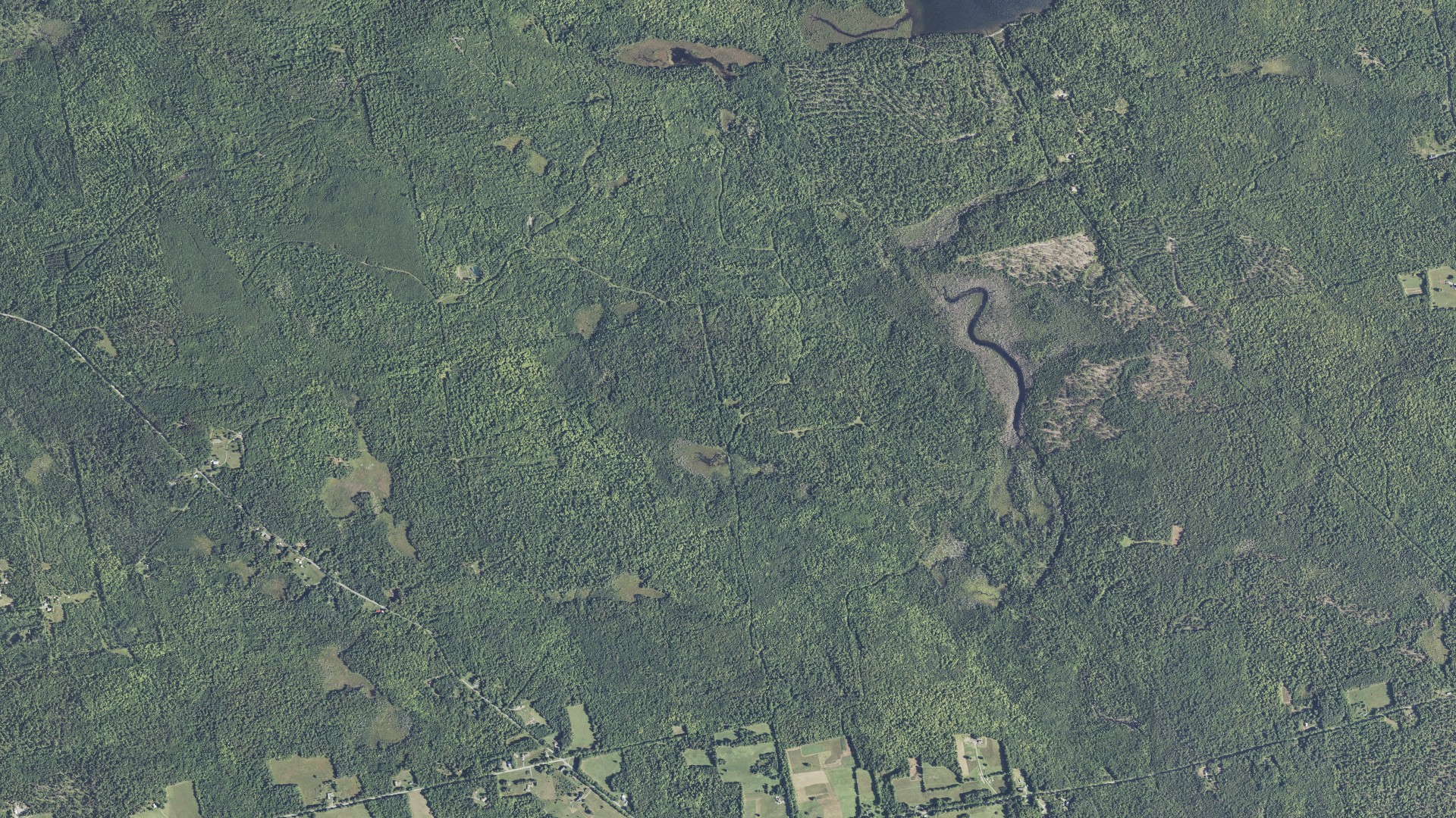 Natural-color aerial photograph of land around Guilford, Maine