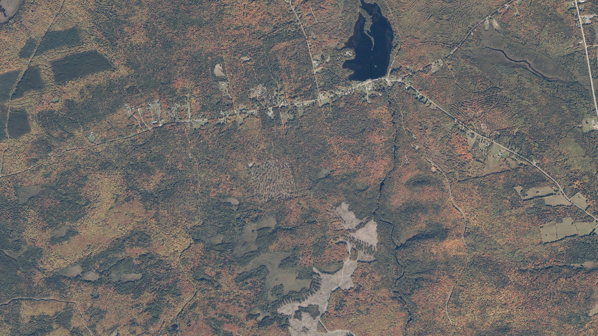 Natural-color aerial photograph of land around Shirley, Maine