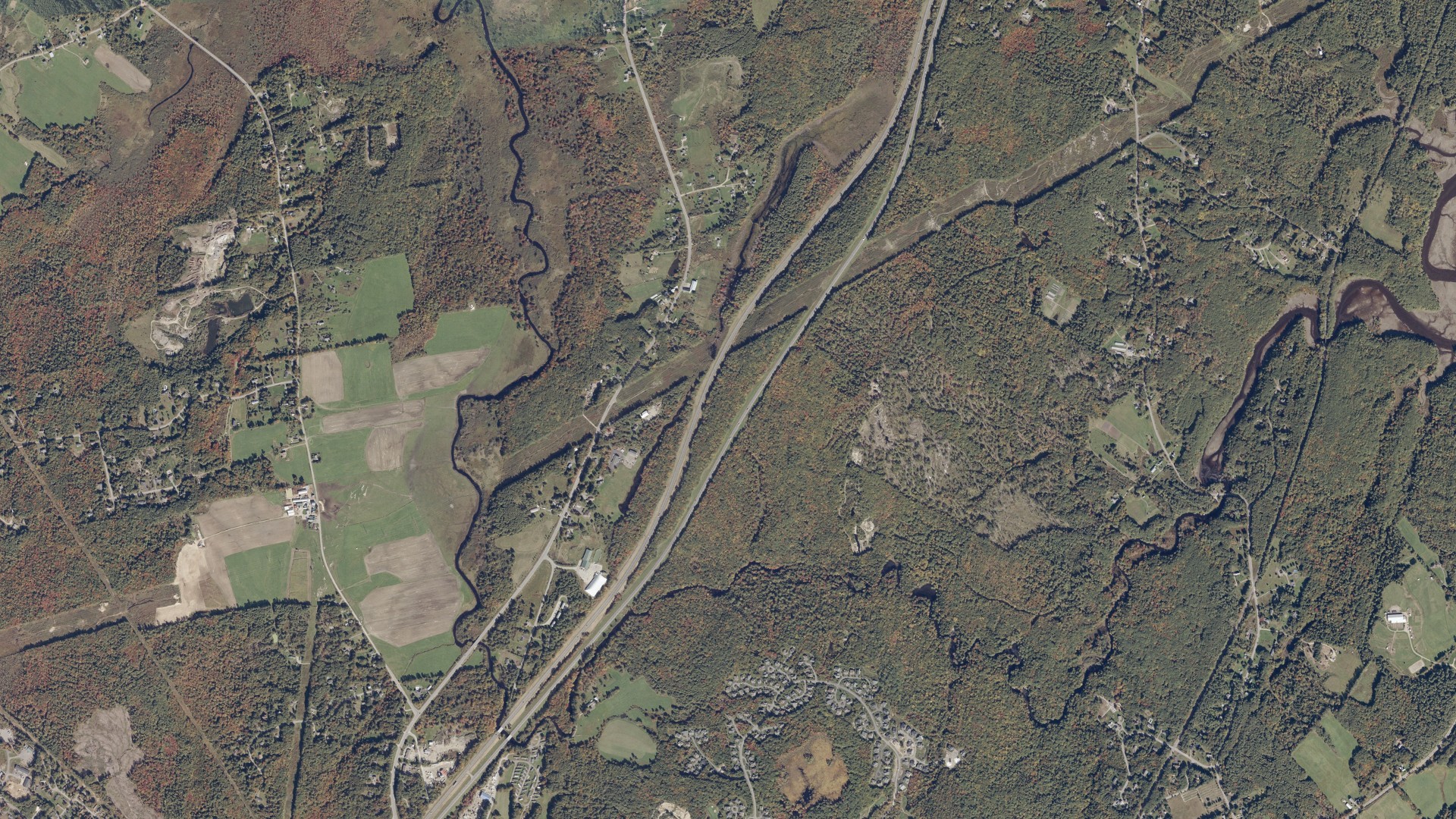 Natural-color aerial photograph of land around Topsham, Maine
