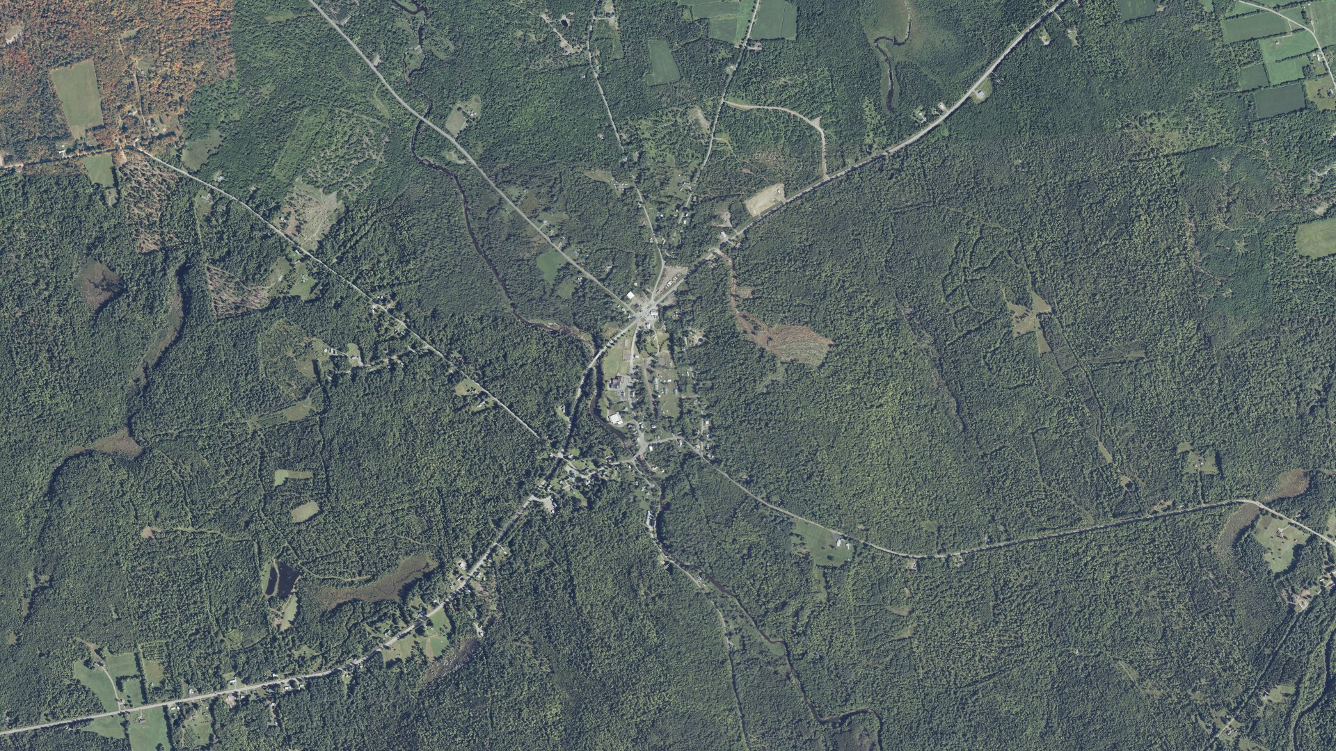 Natural-color aerial photograph of land around Harmony, Maine