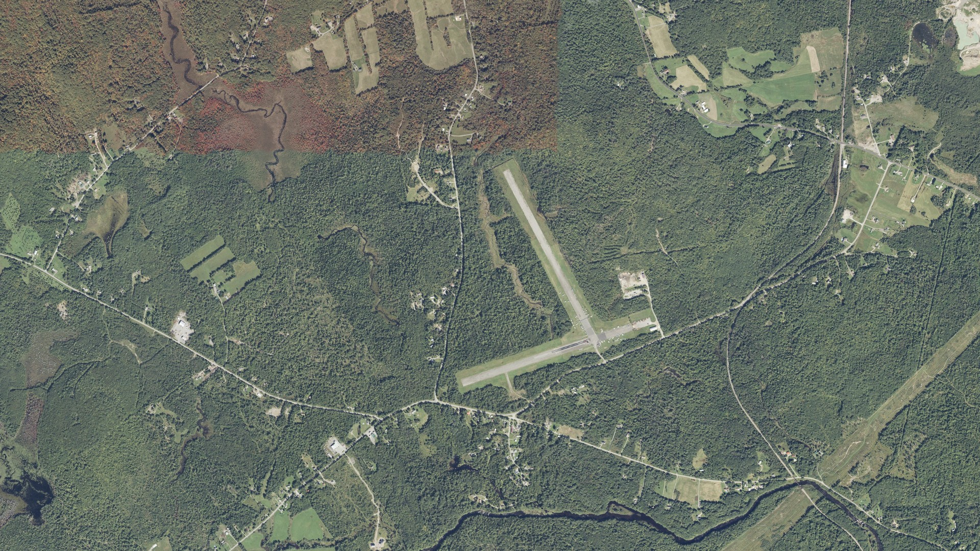 Natural-color aerial photograph of land around Winterport, Maine