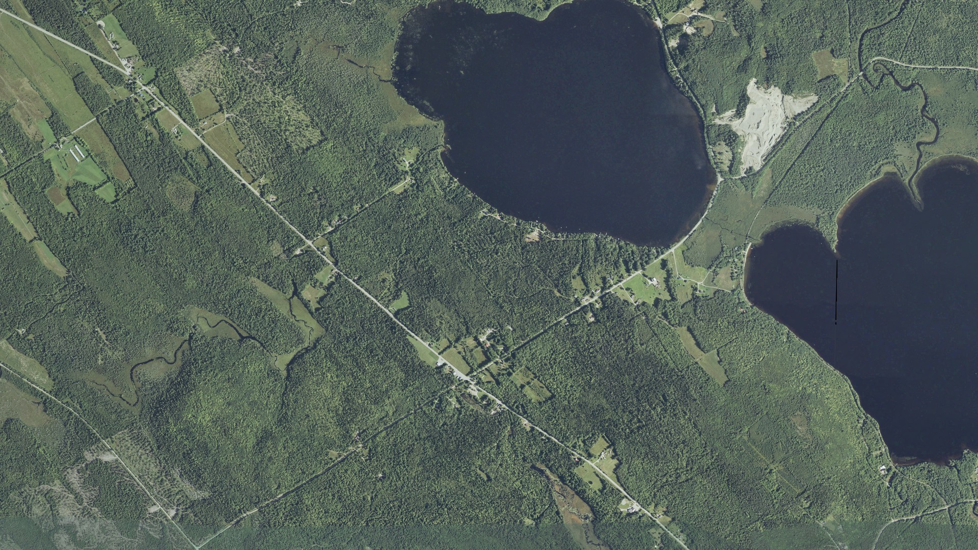 Natural-color aerial photograph of land around Charlotte, Maine