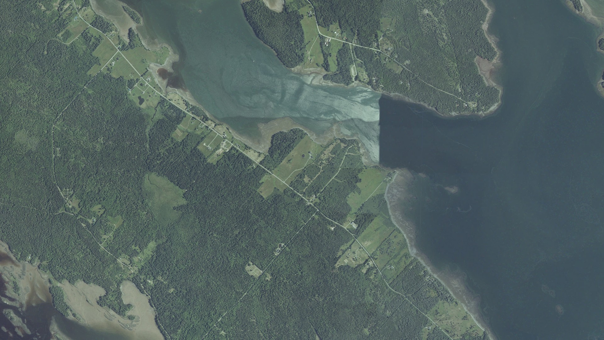 Natural-color aerial photograph of land around Pembroke, Maine