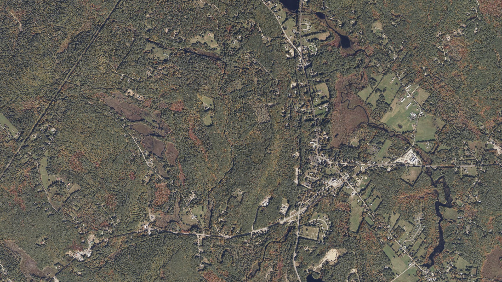 Natural-color aerial photograph of land around Alfred, Maine