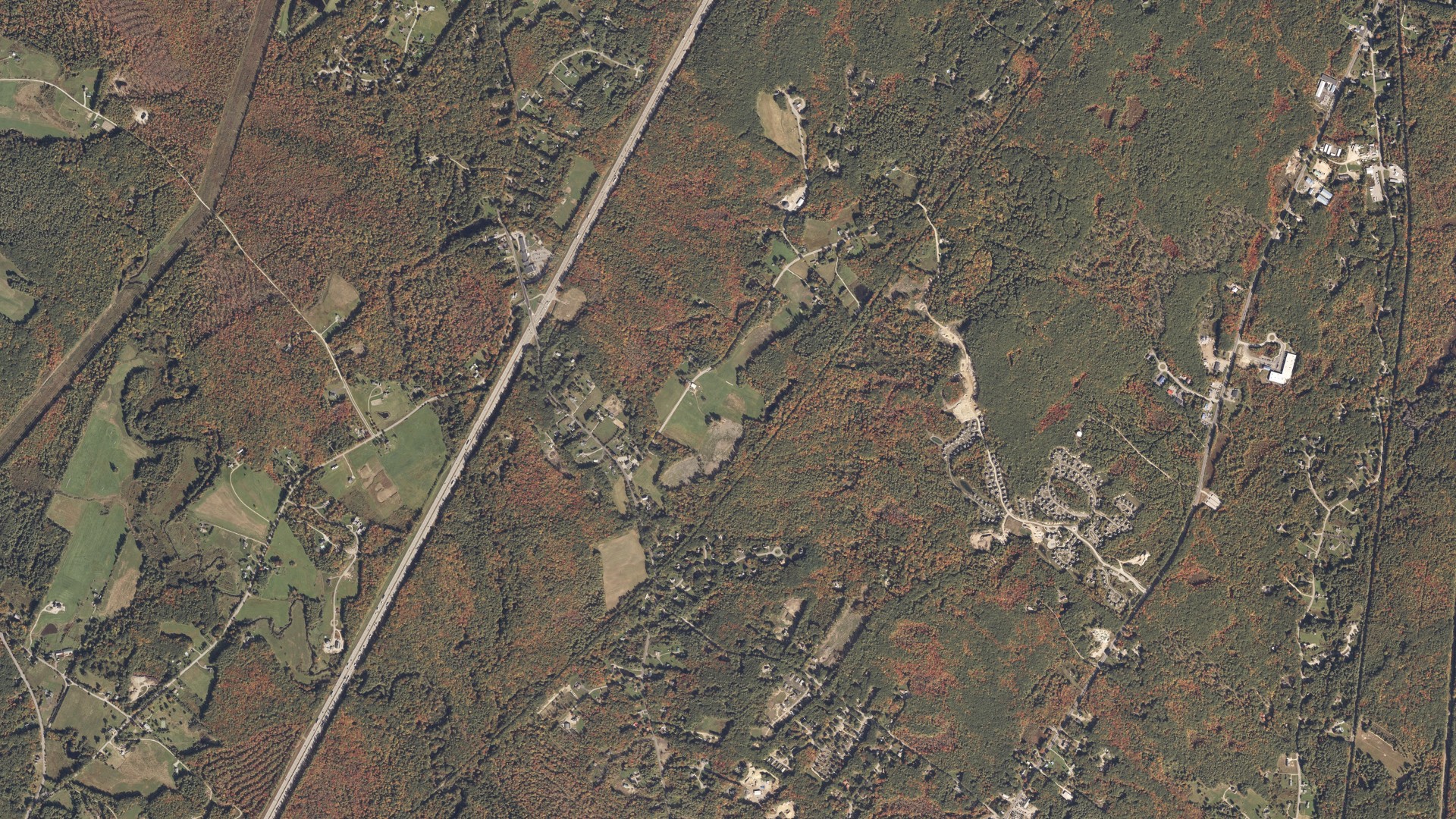 Natural-color aerial photograph of land around Arundel, Maine
