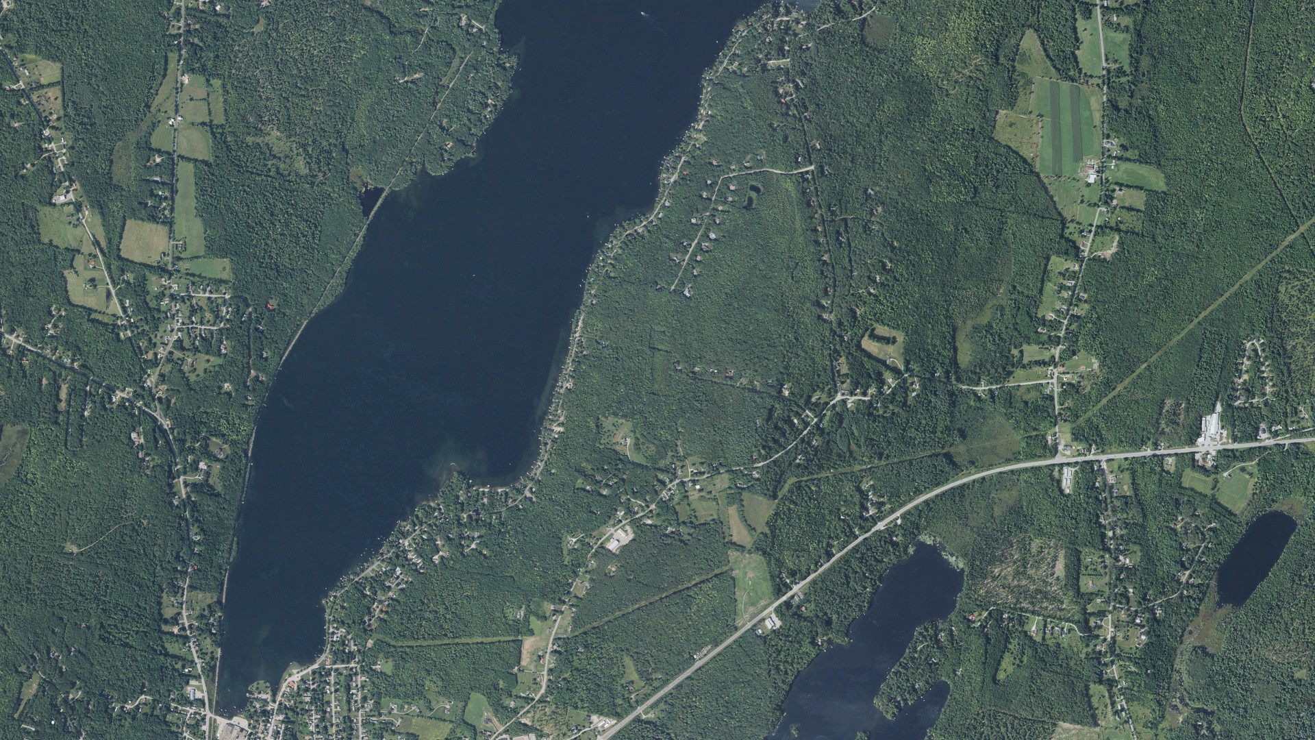 Natural-color aerial photograph of land around Winthrop, Maine