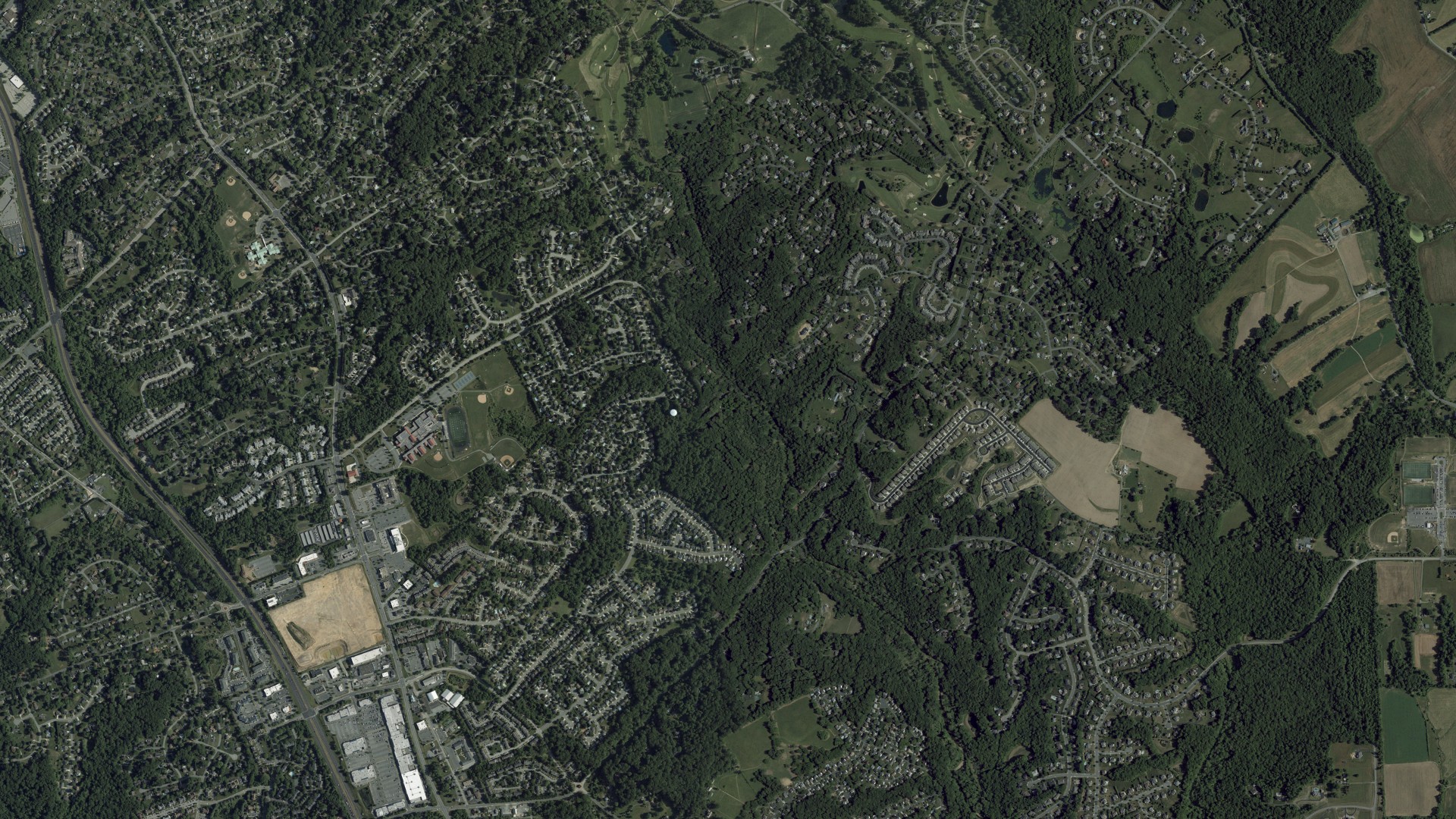 Natural-color aerial photograph of land around Bel Air South, Maryland