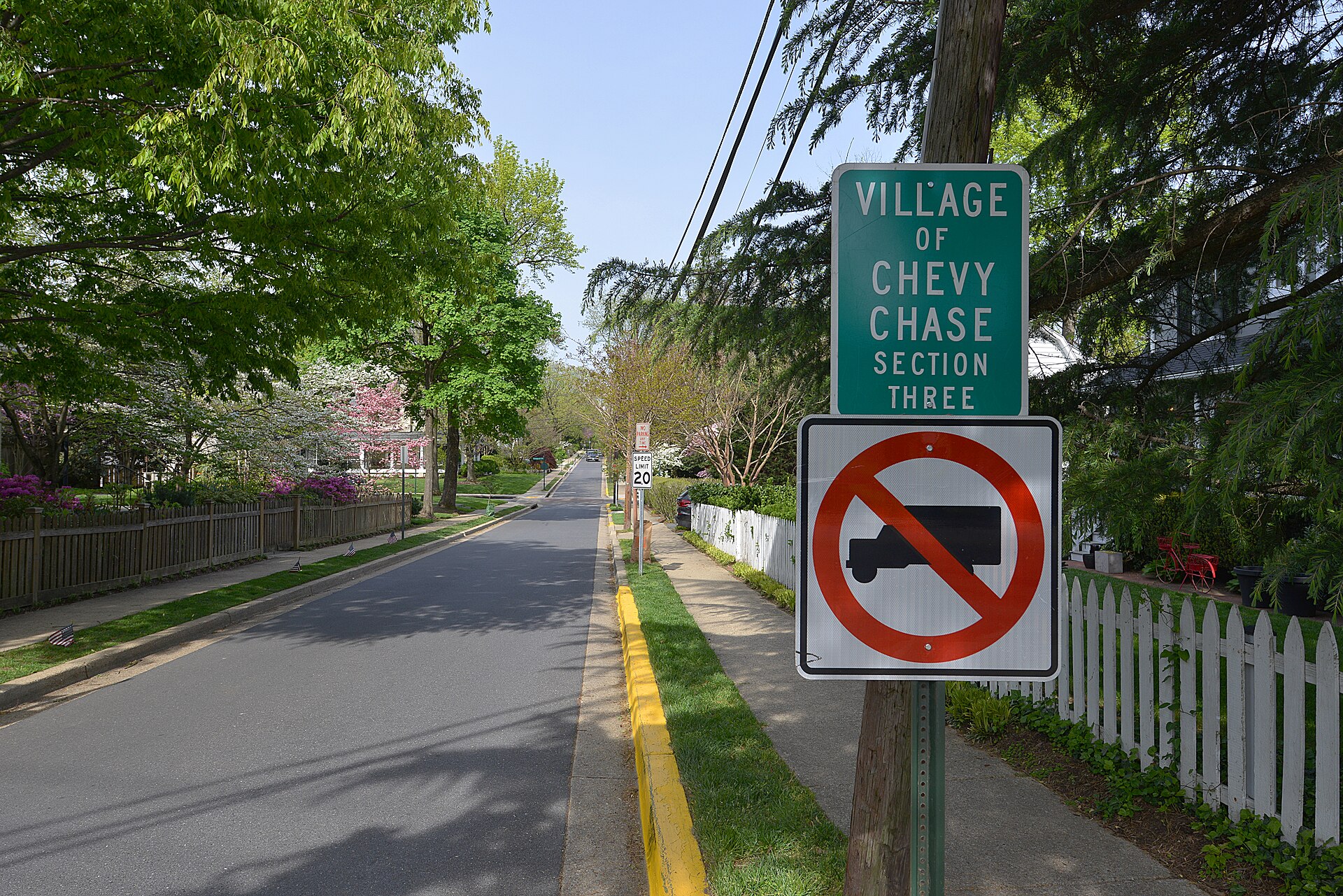 Sign and entrance road to the Village of Chevy Chase Section Three in Maryland.