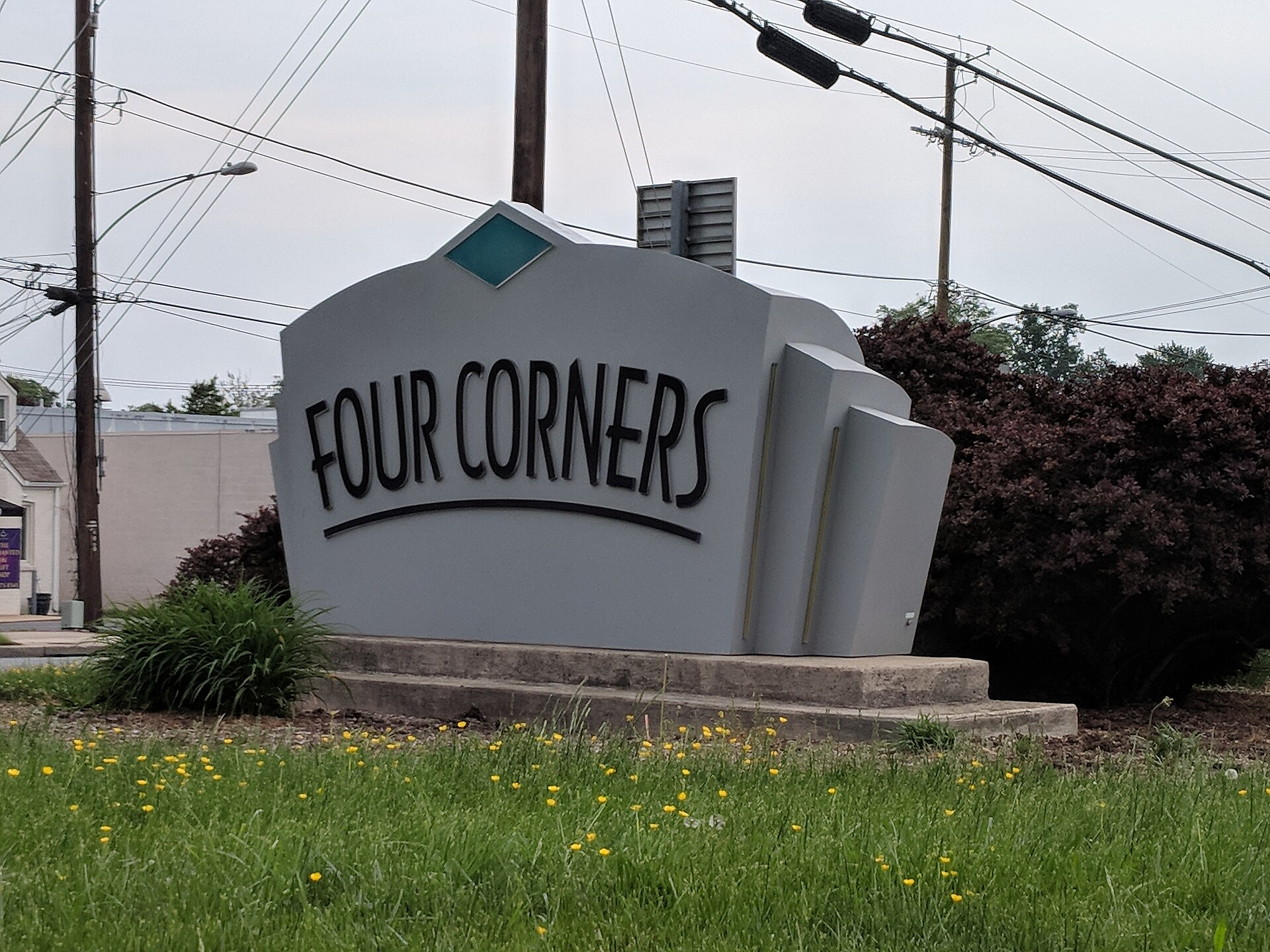Sign for Four Corners, Maryland.