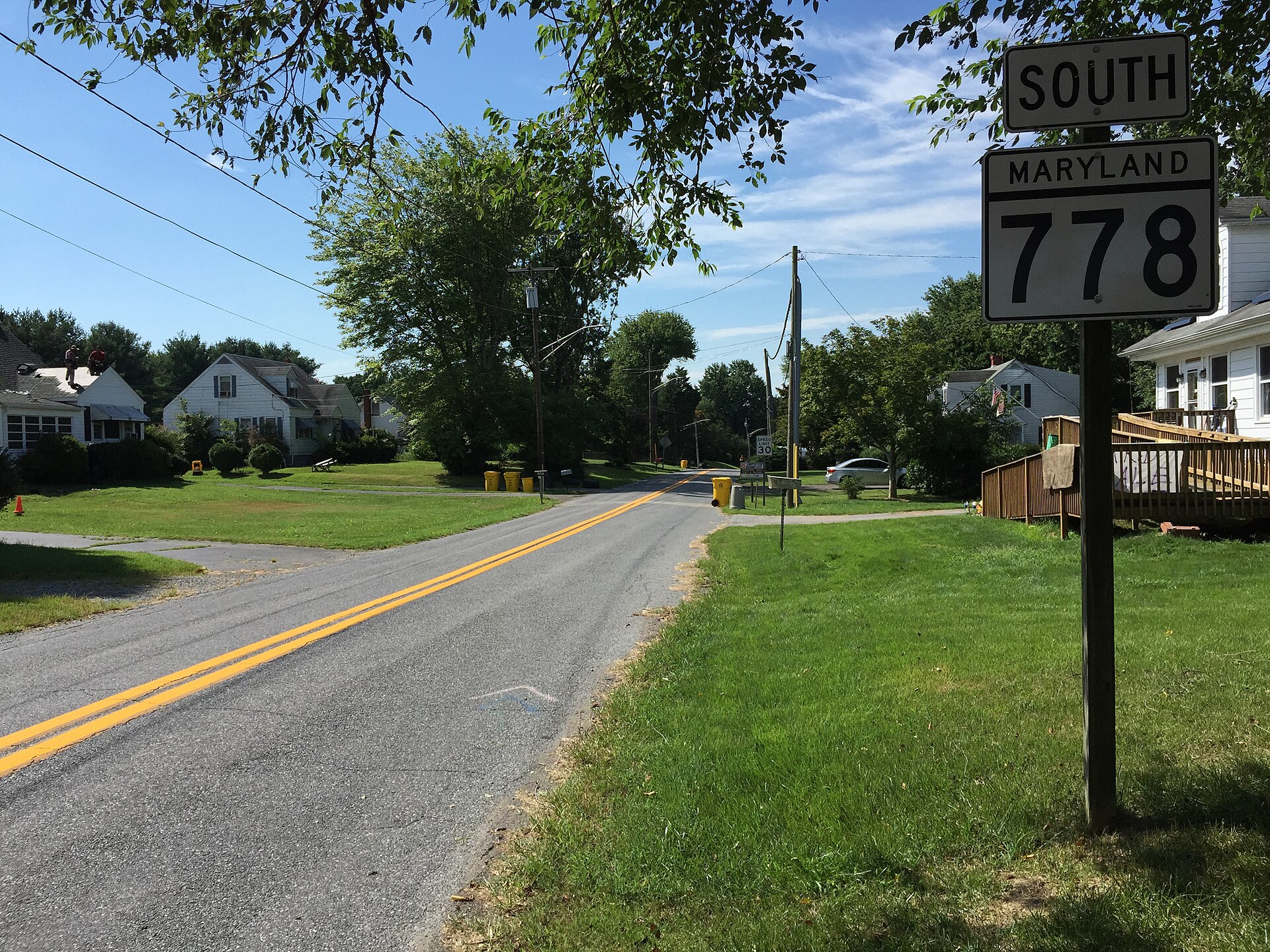 View south along Maryland State Route 778 (Old Solomons Island Road) at Maryland State Route 261 (Friendship Road) in Friendship, Anne Arundel County, Maryland