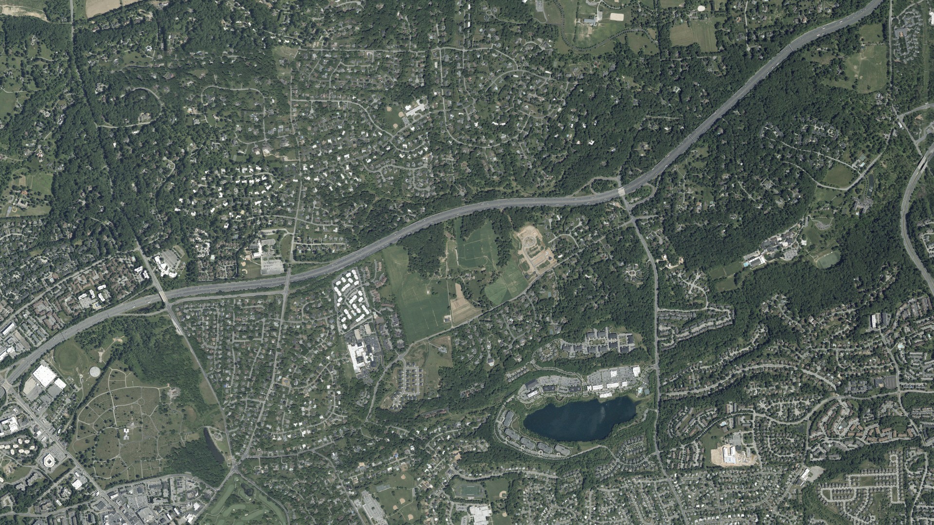 Natural-color aerial photograph of land around Pikesville, Maryland