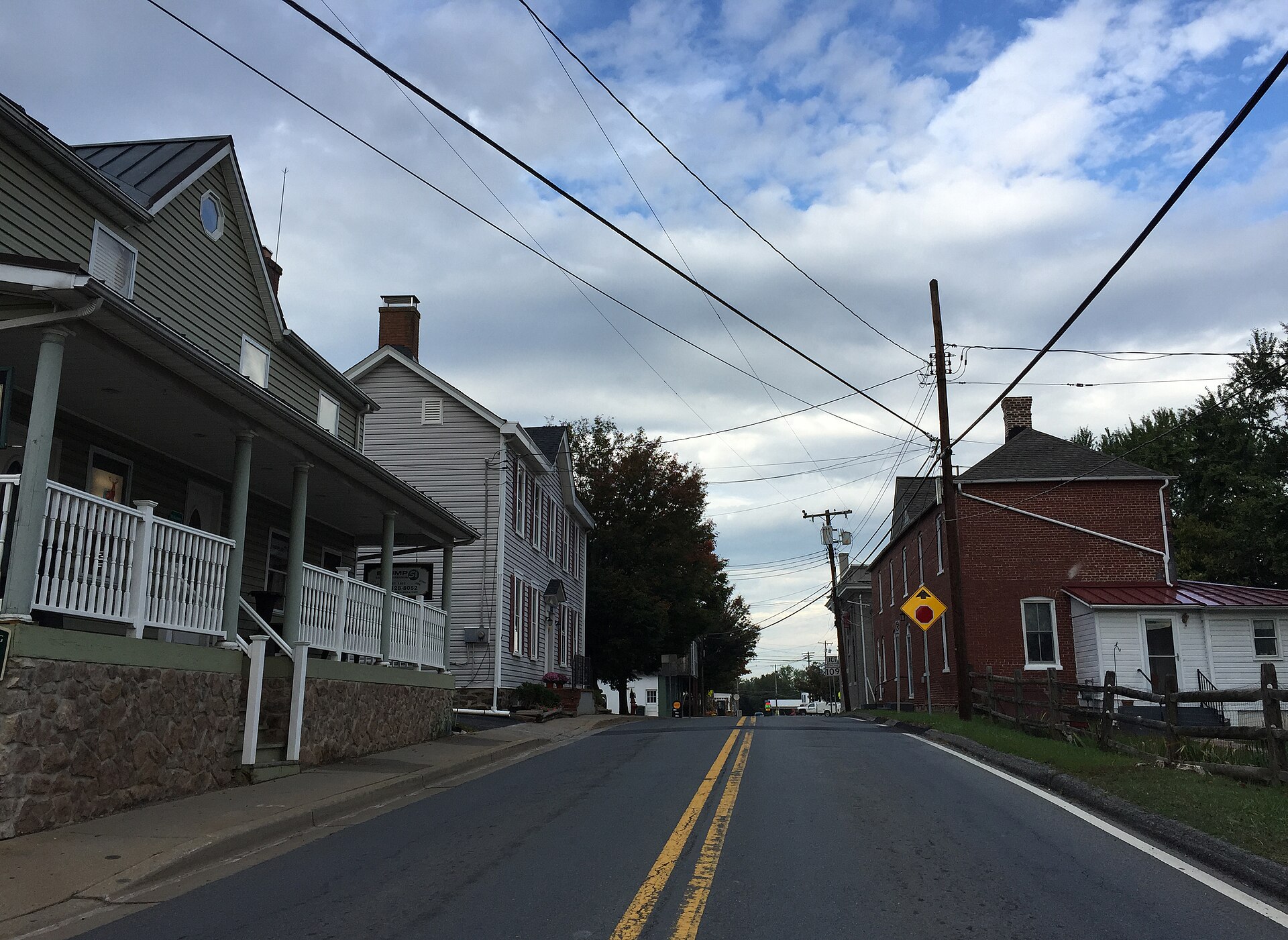 View west along Maryland State Route 107 (Fisher Avenue) at Norris Road in Poolesville, Montgomery County, Maryland