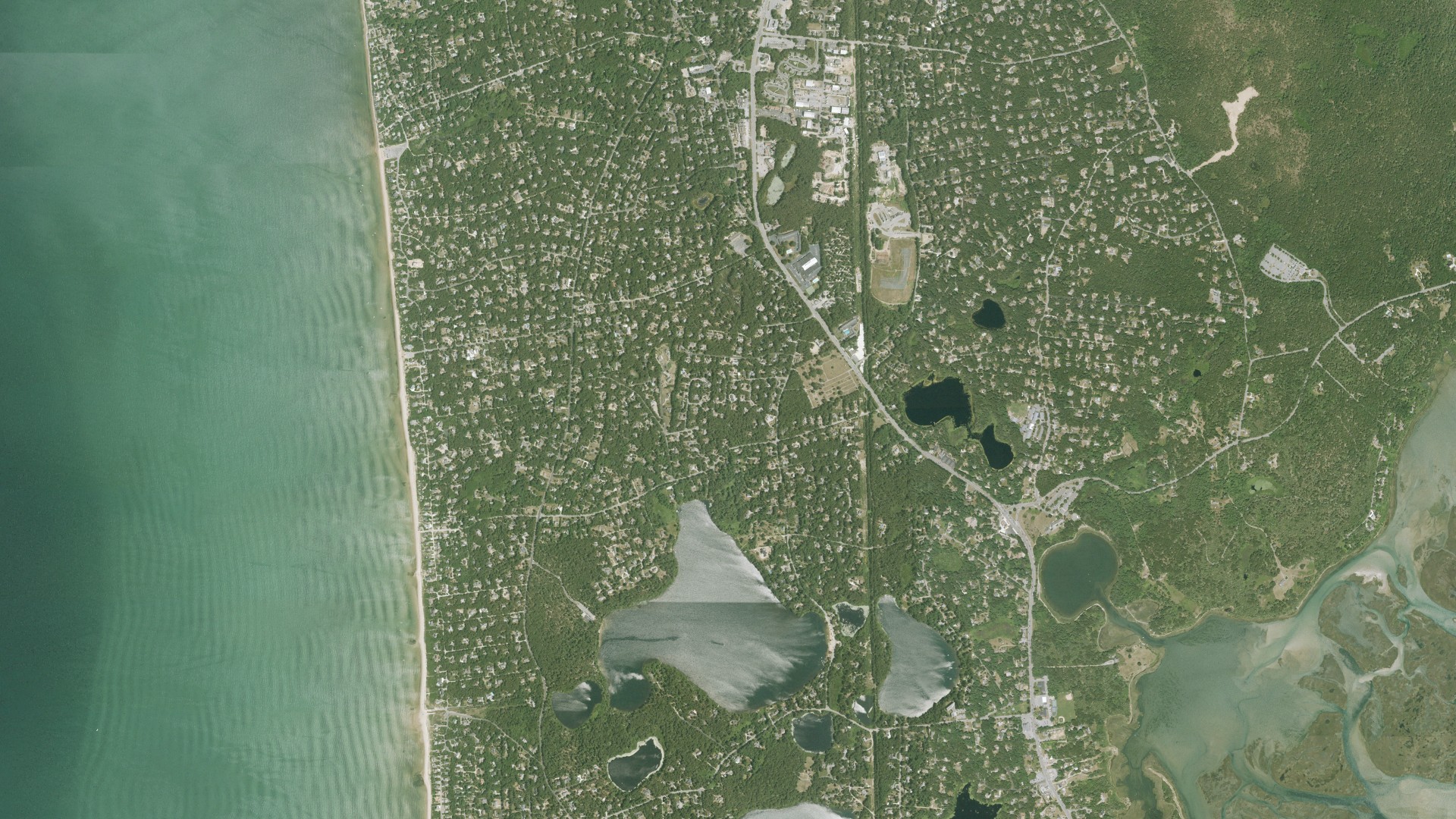 Natural-color aerial photograph of land around Eastham, Massachusetts
