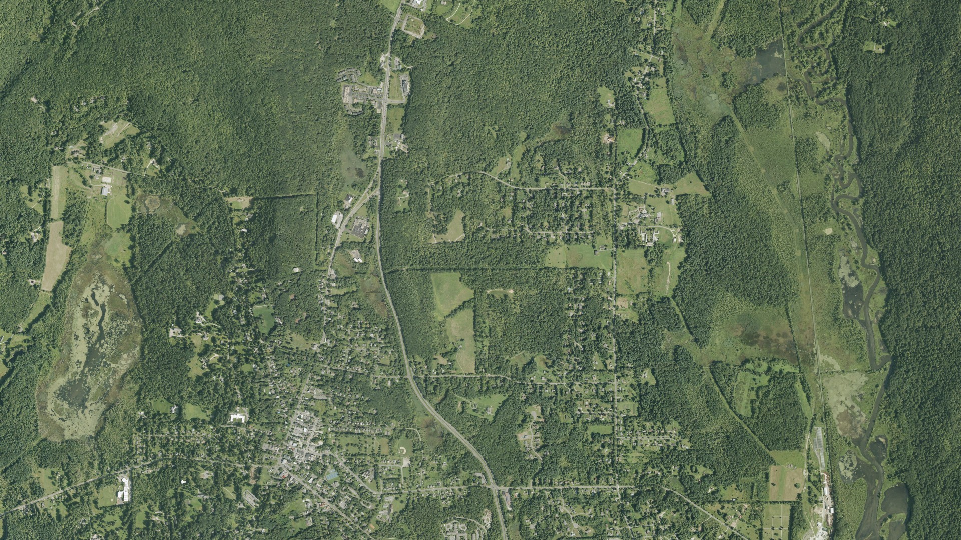 Natural-color aerial photograph of land around Lenox, Massachusetts