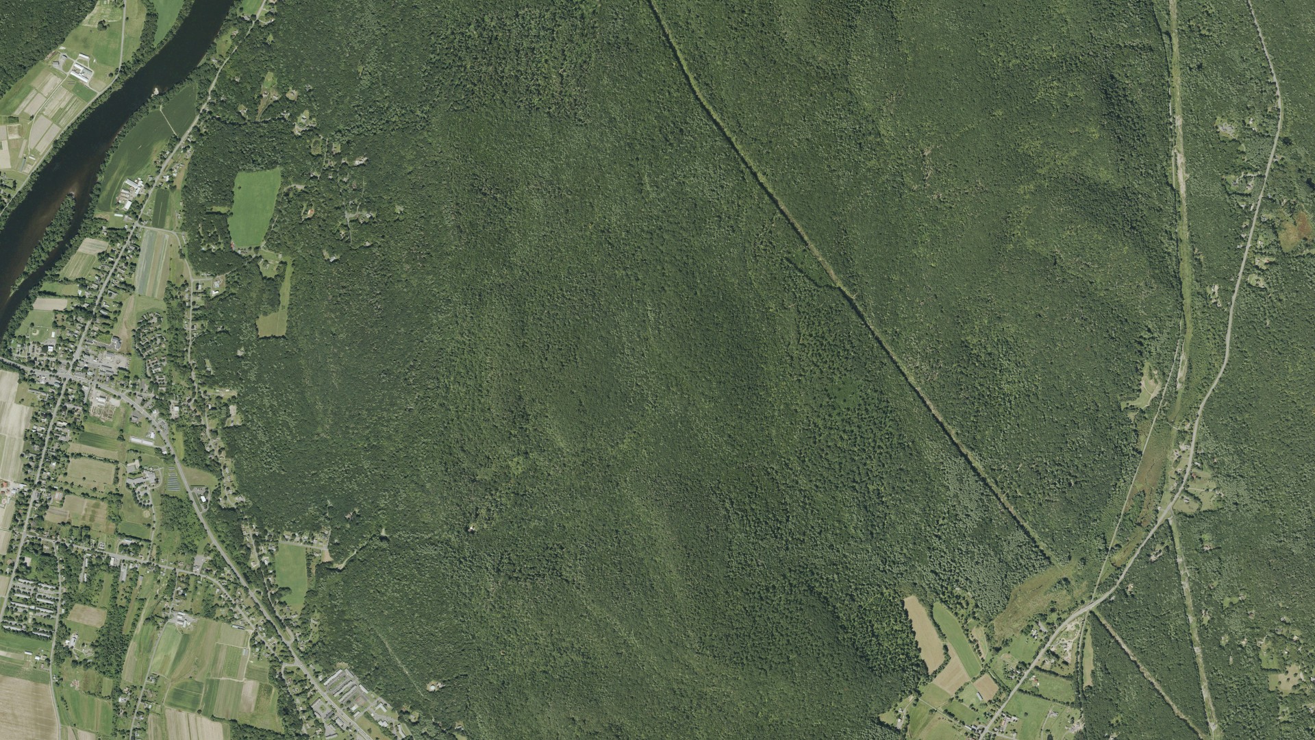 Natural-color aerial photograph of land around Sunderland, Massachusetts