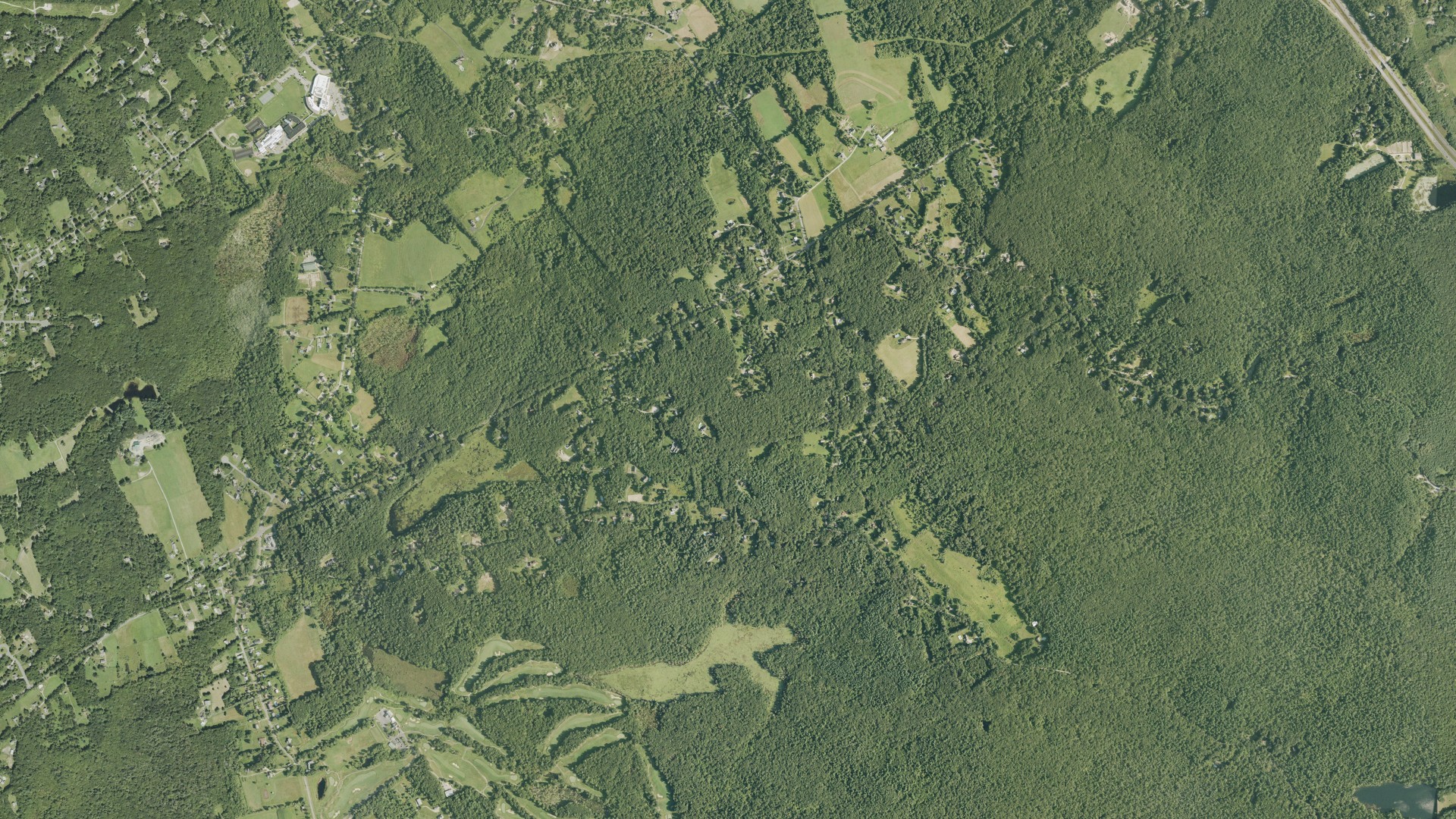 Natural-color aerial photograph of land around Sutton, Massachusetts