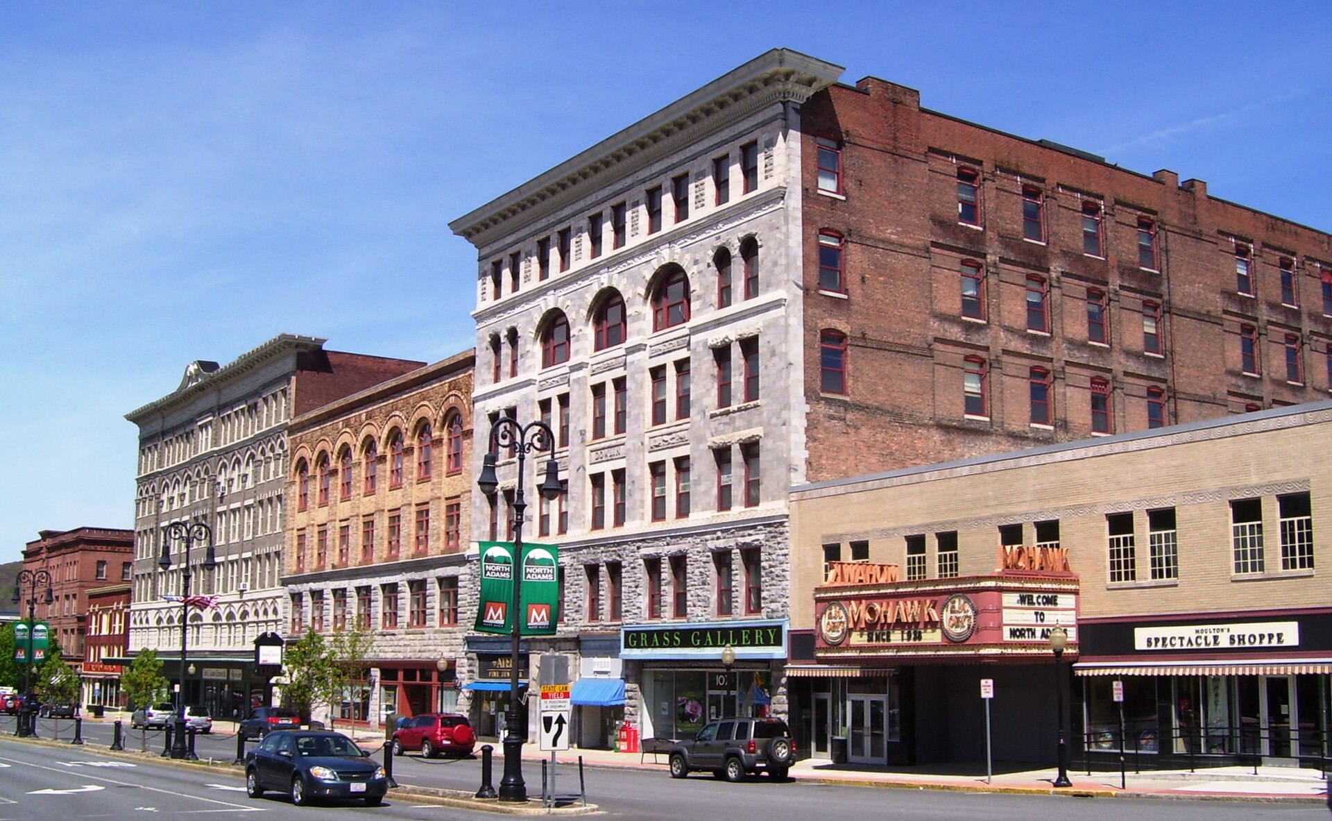 The north side of Main Street between Eagle and Holden Street in North Adams, Massachusetts, is located within the expanded boundaries of the Monument Square-Eagle Street Historic District.