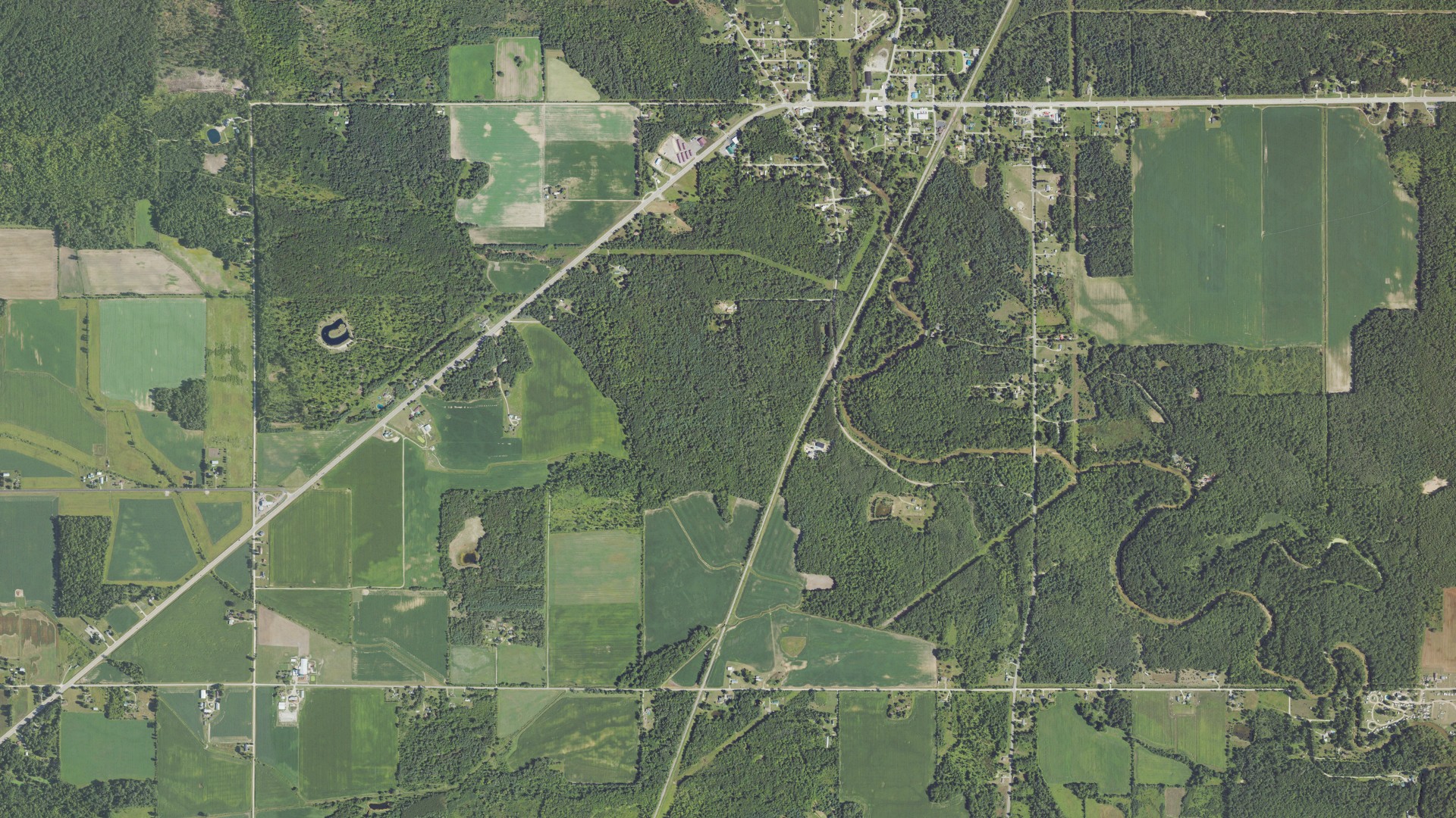 Aerial view of land around Arenac, Michigan