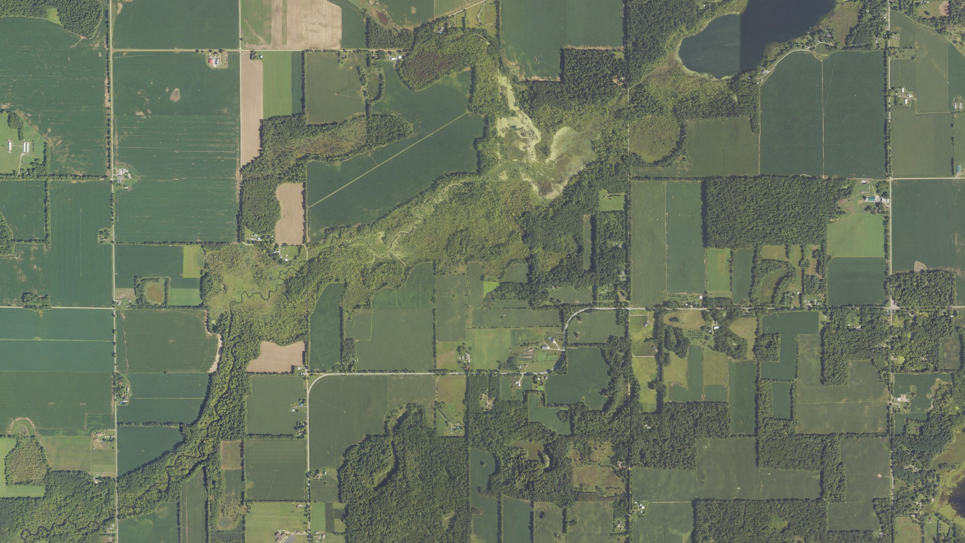 Natural-color aerial photograph of land around Volinia, Michigan