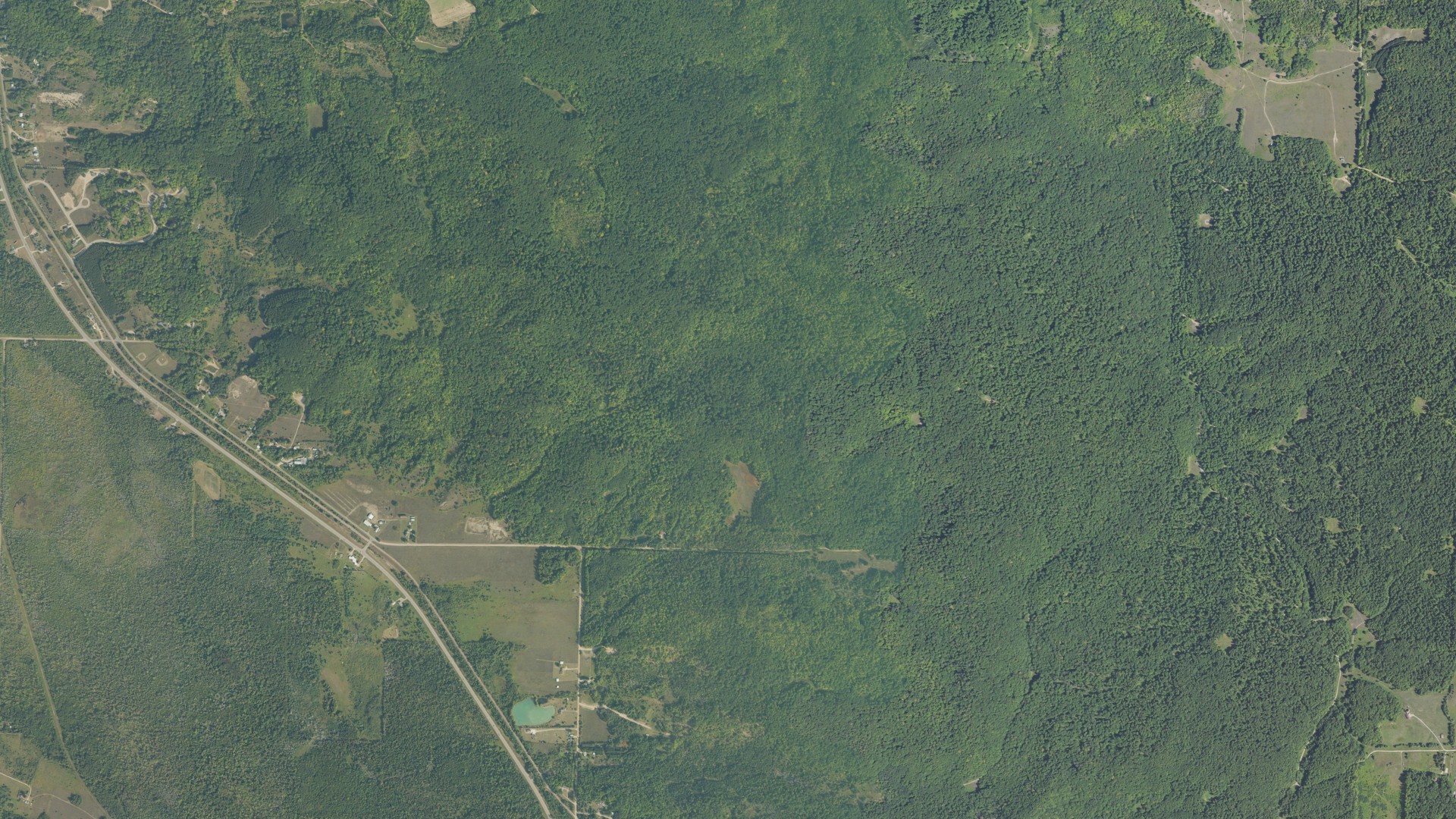 Aerial view of land around Boyne Valley, Michigan