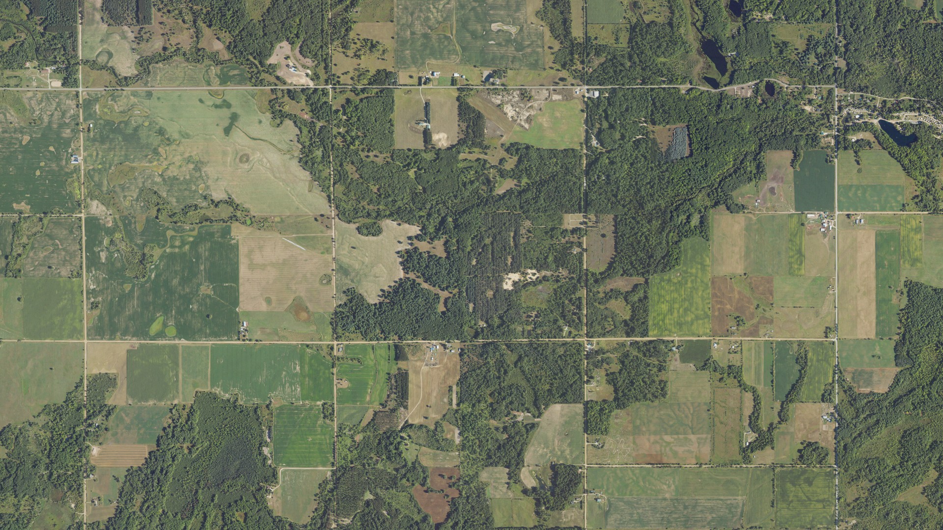 Natural-color aerial photograph of land around Arthur, Michigan