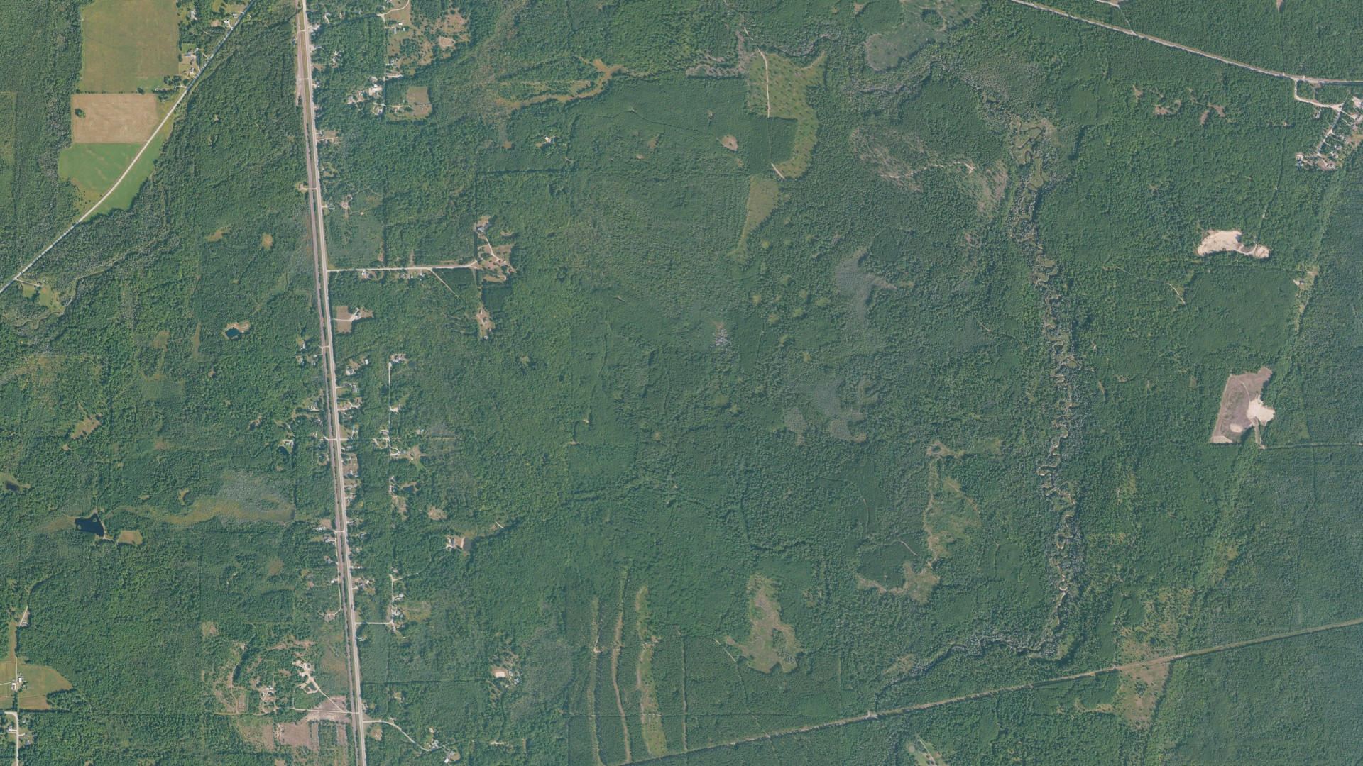 Aerial view of land around Brampton, Michigan