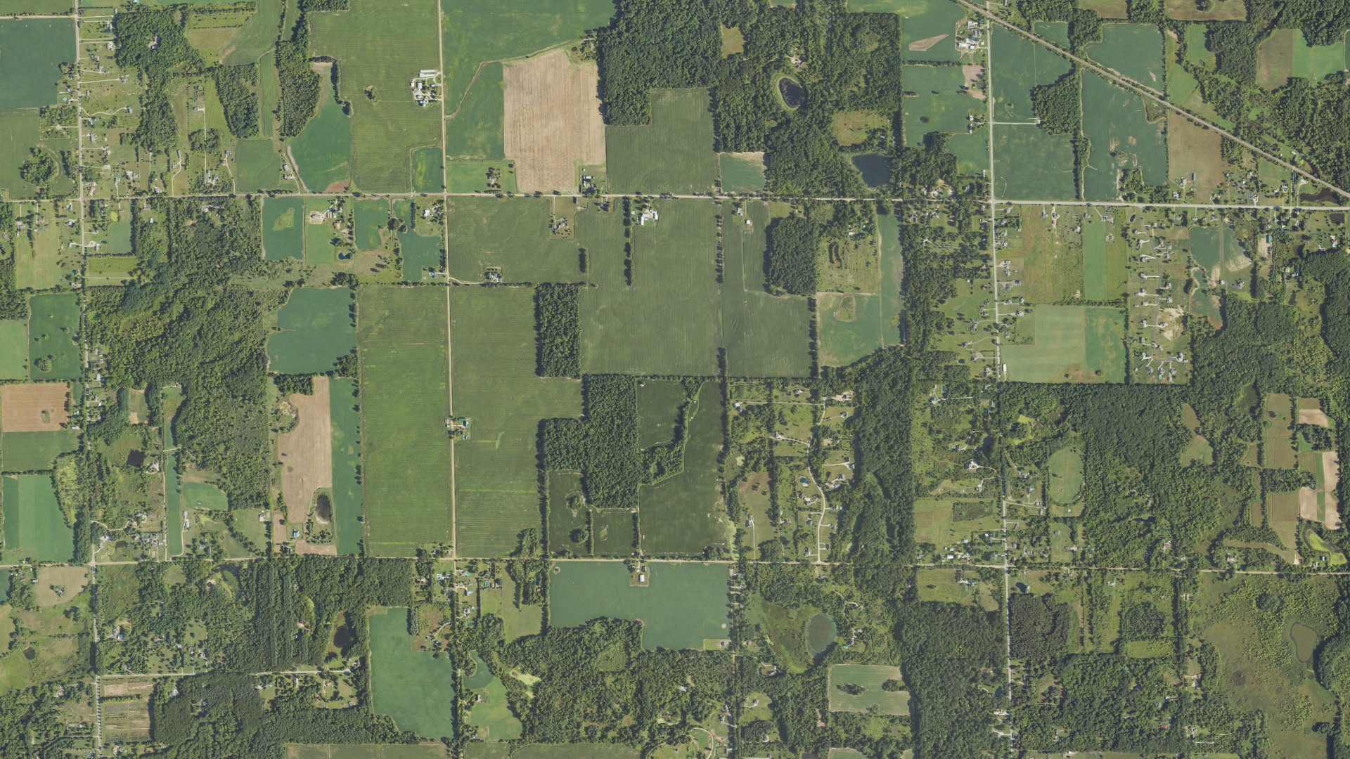 Natural-color aerial photograph of land around Argentine, Michigan