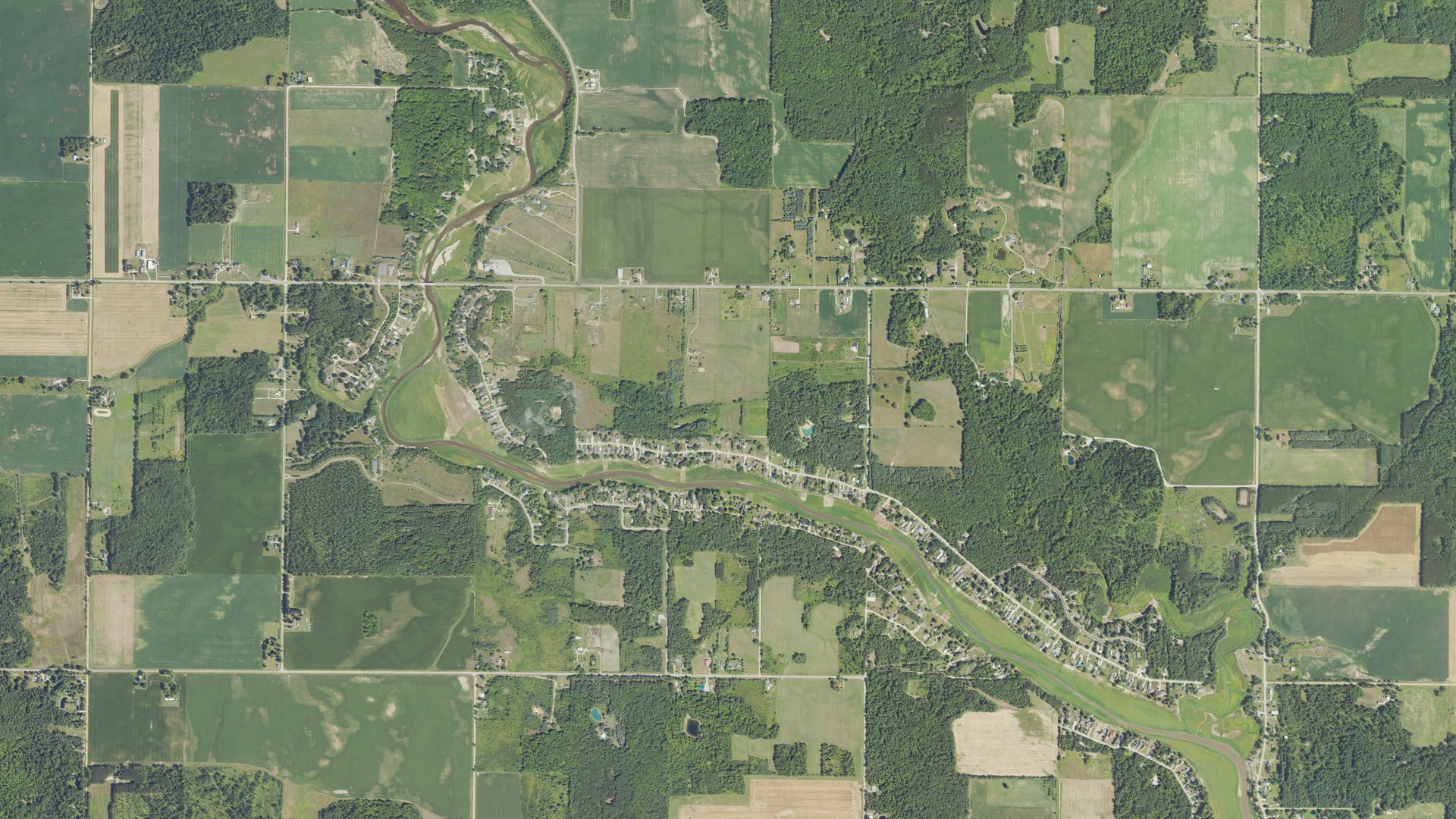 Natural-color aerial photograph of land around Tobacco, Michigan