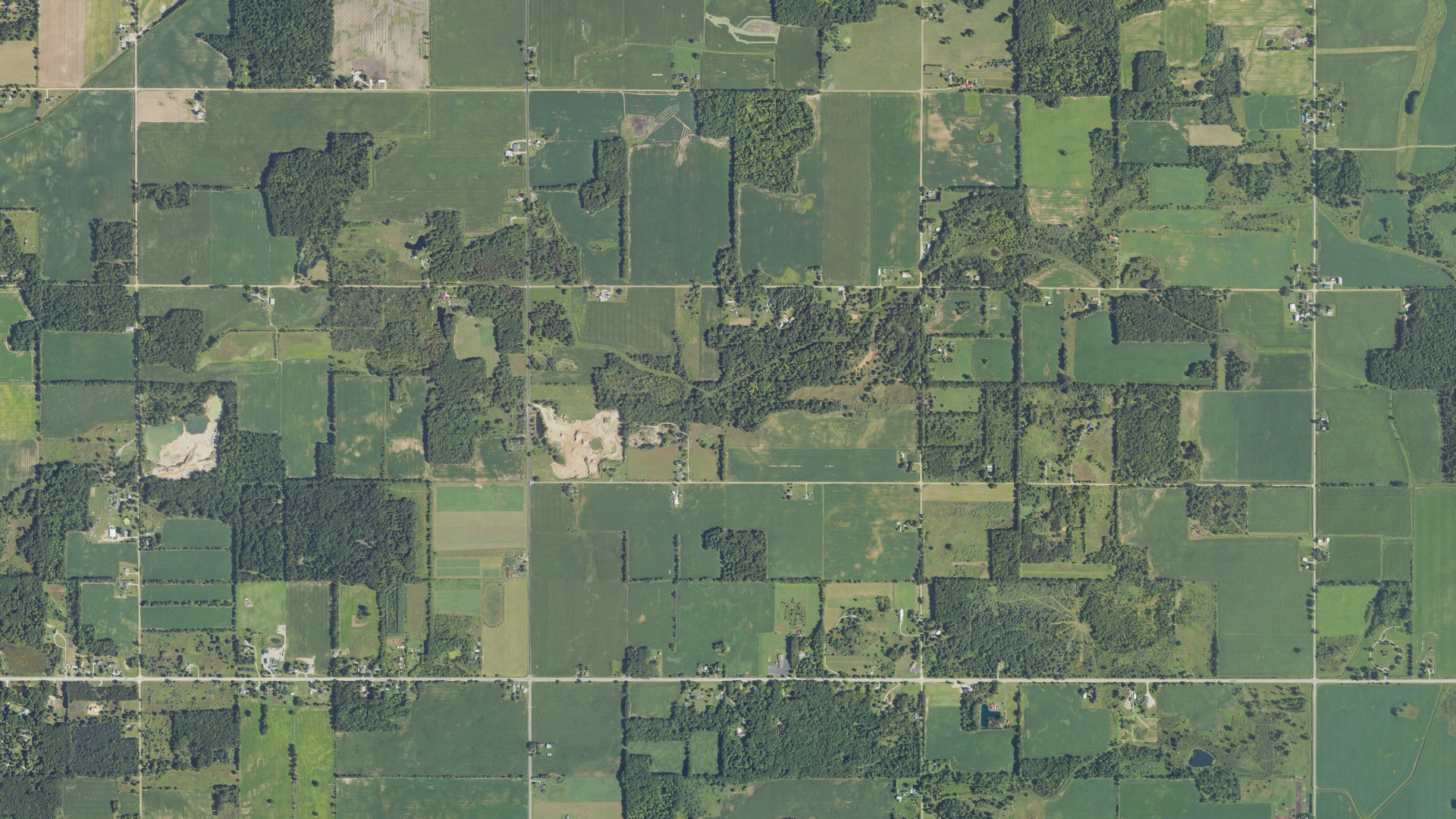 Natural-color aerial photograph of land around Seville, Michigan